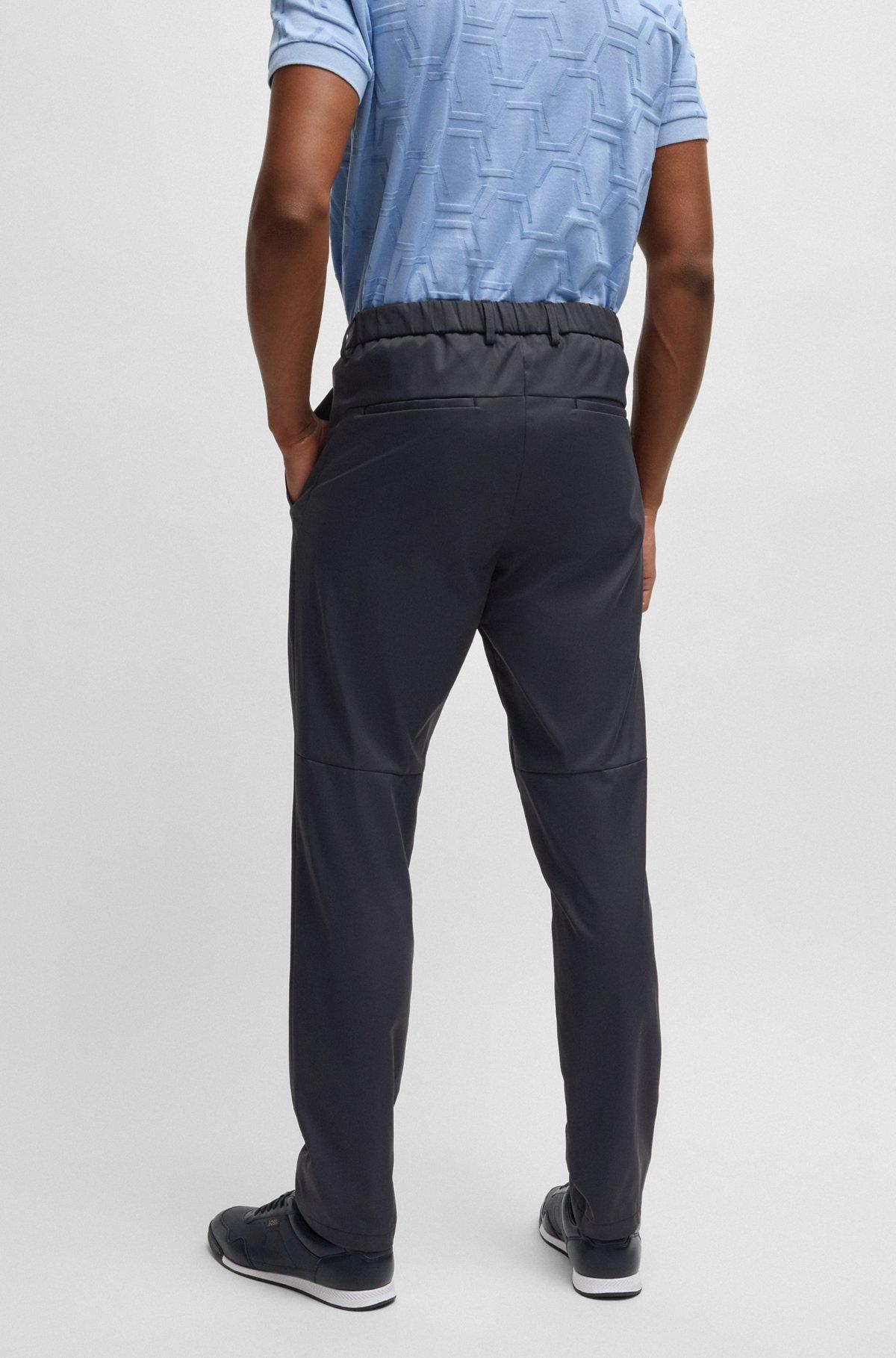 Regular-fit chinos with hidden drawcord and tapered leg Product Image