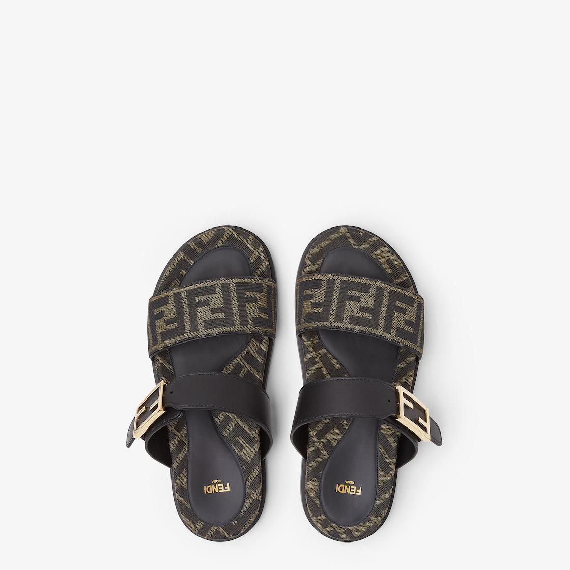 Fendi FeelBlack leather and brown FF fabric slides Product Image