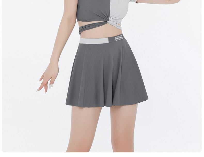Set: Short-Sleeve Two Tone Knot Crop Swim Top + Skirt + Bikini Bottom Product Image