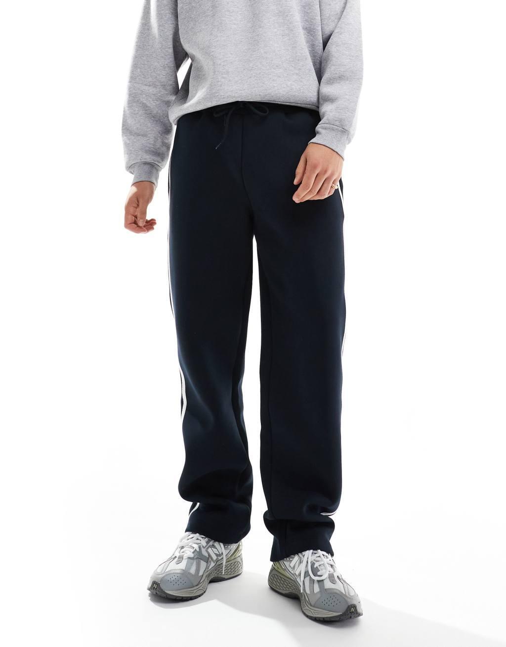 ASOS DESIGN straight leg scuba sweatpants with contrast taping detail in navy Product Image