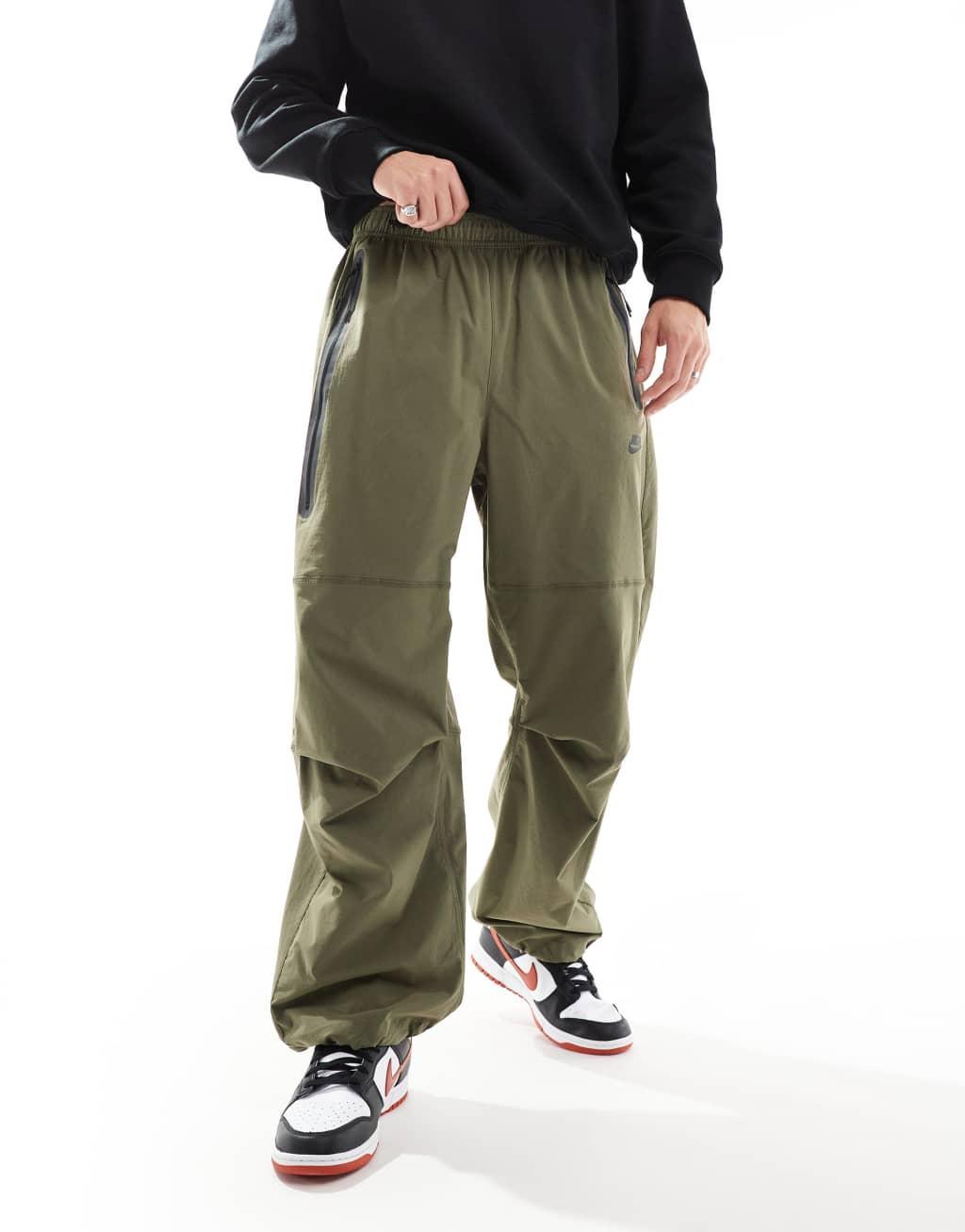 Nike Tech Woven oversized pants in khaki Product Image