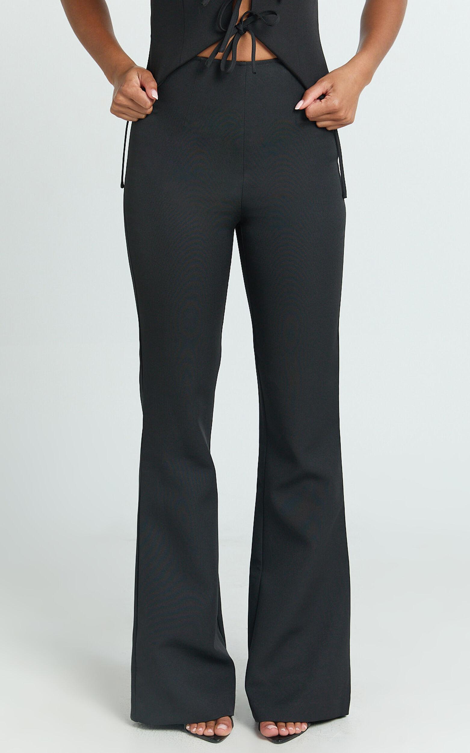 Nola Pants - Mid Waisted Pleated Flare Pants in Black Product Image