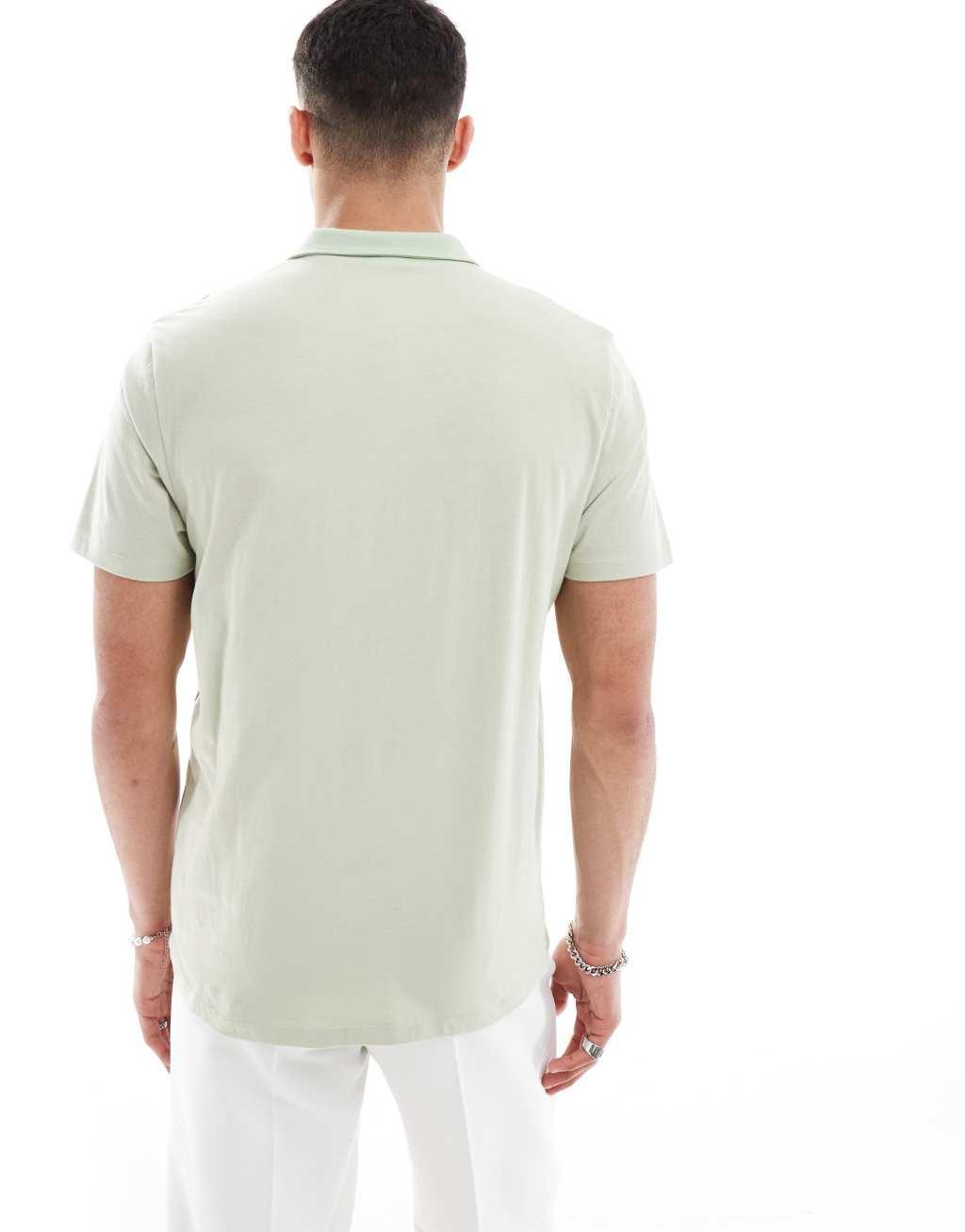 ASOS DESIGN polo in green and white stripe Product Image