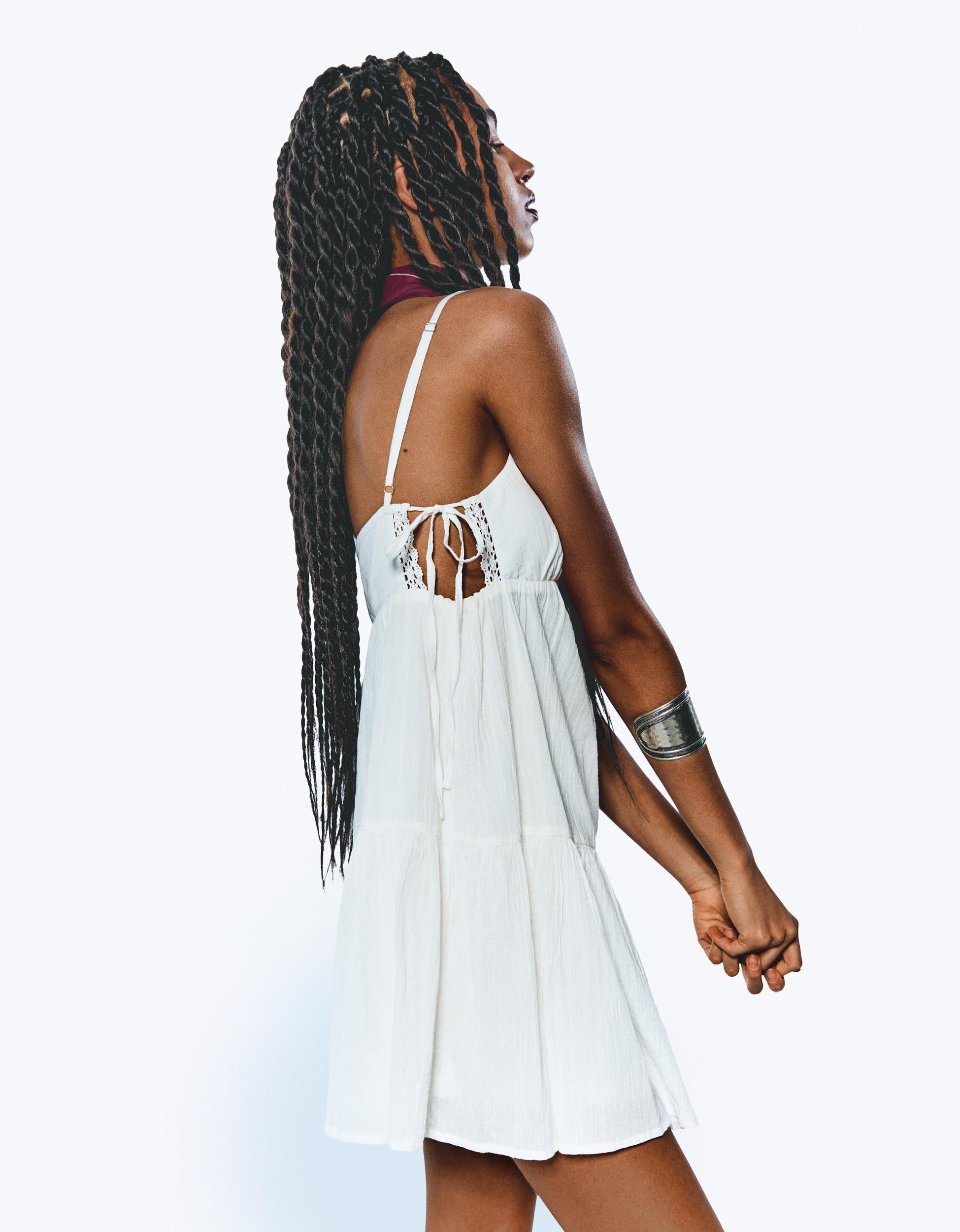 Textured mini dress with lace trim Product Image