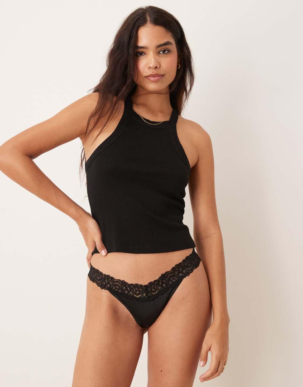 Calvin Klein Attraction lace detail thong in black Product Image