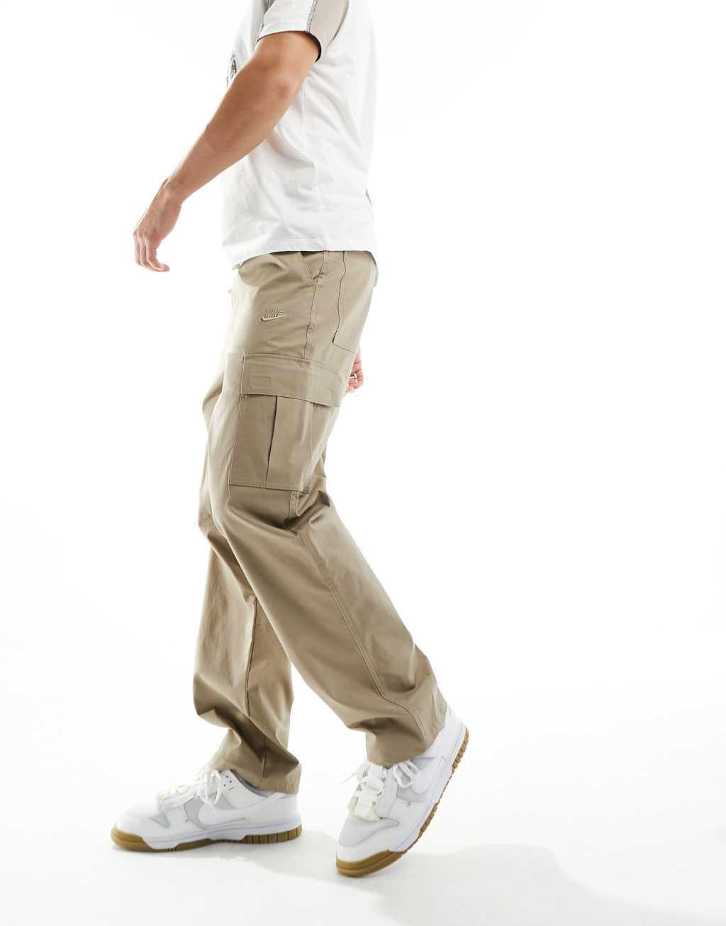 Nike Club woven pants in beige  Product Image