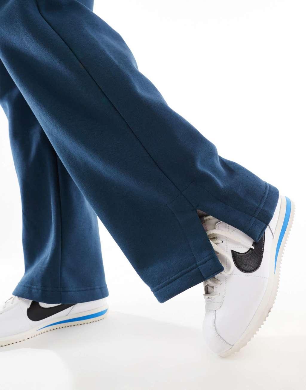 Nike Phoenix Fleece high rise wide leg sweatpants in navy Product Image