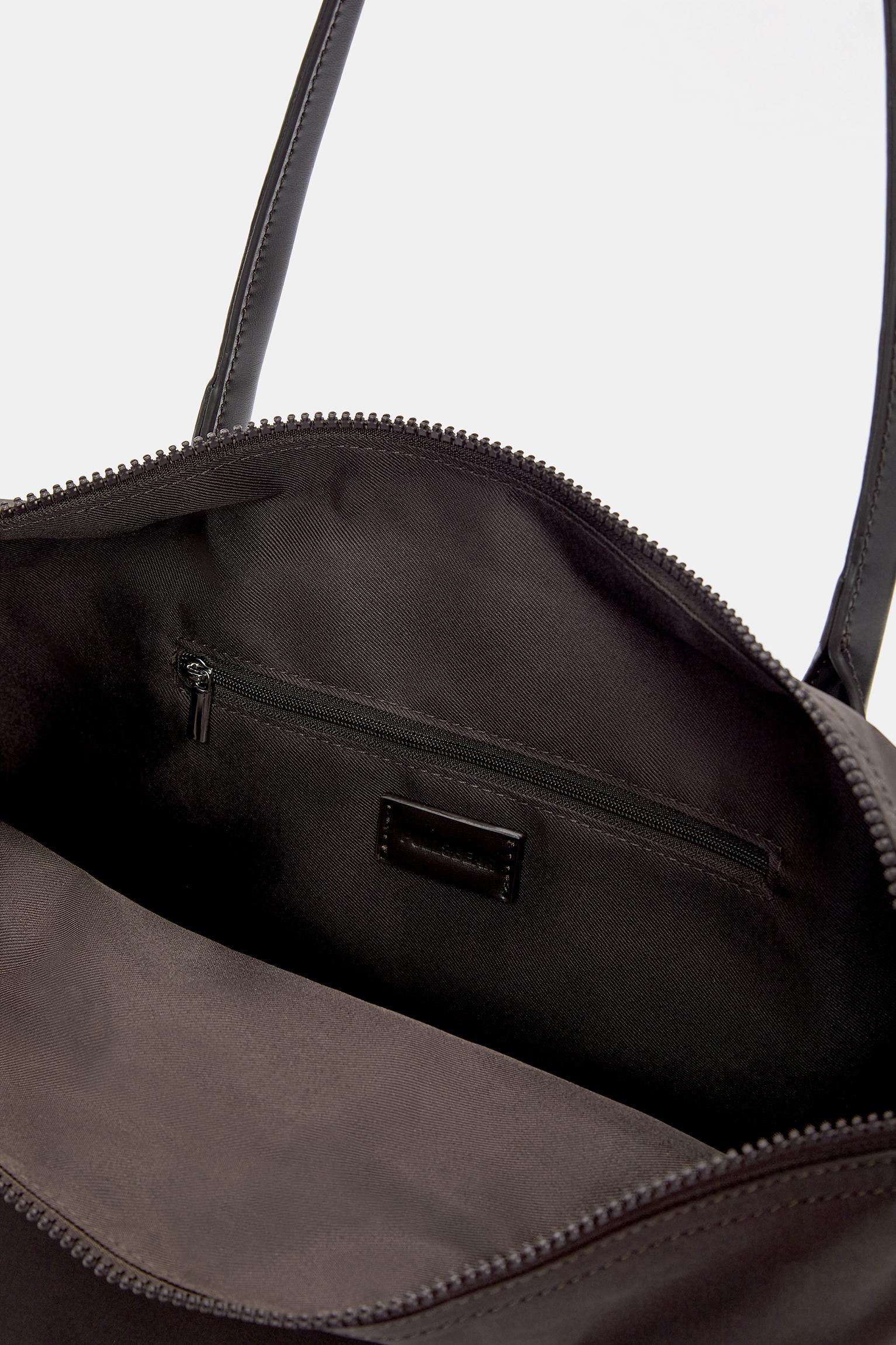 Nylon shopper bag with charm detail Product Image