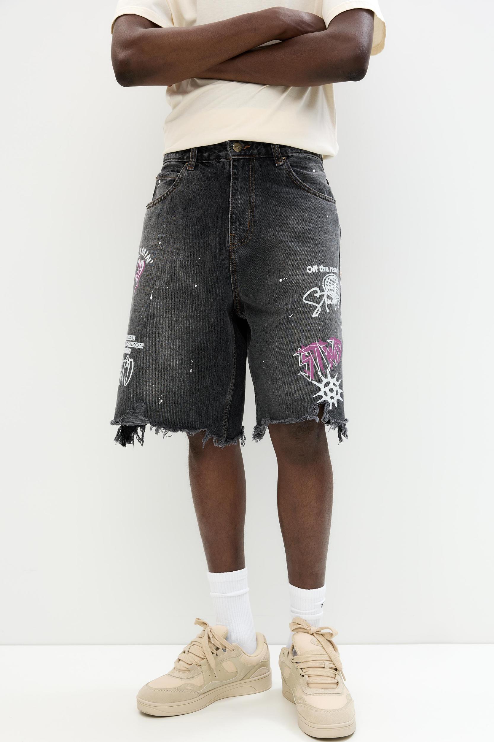 Ripped denim Bermuda shorts Product Image