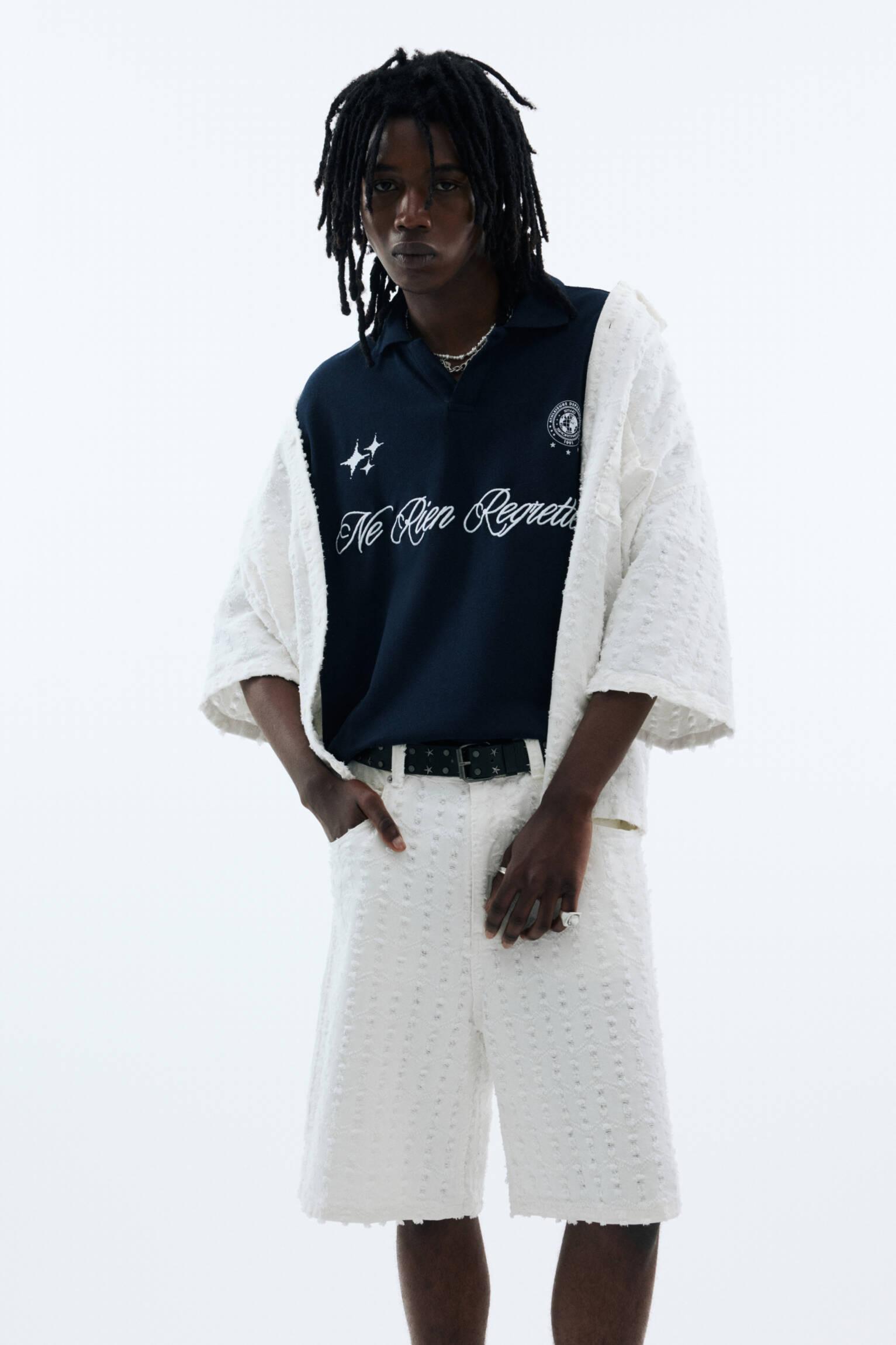 Textured baggy denim Bermuda shorts Product Image