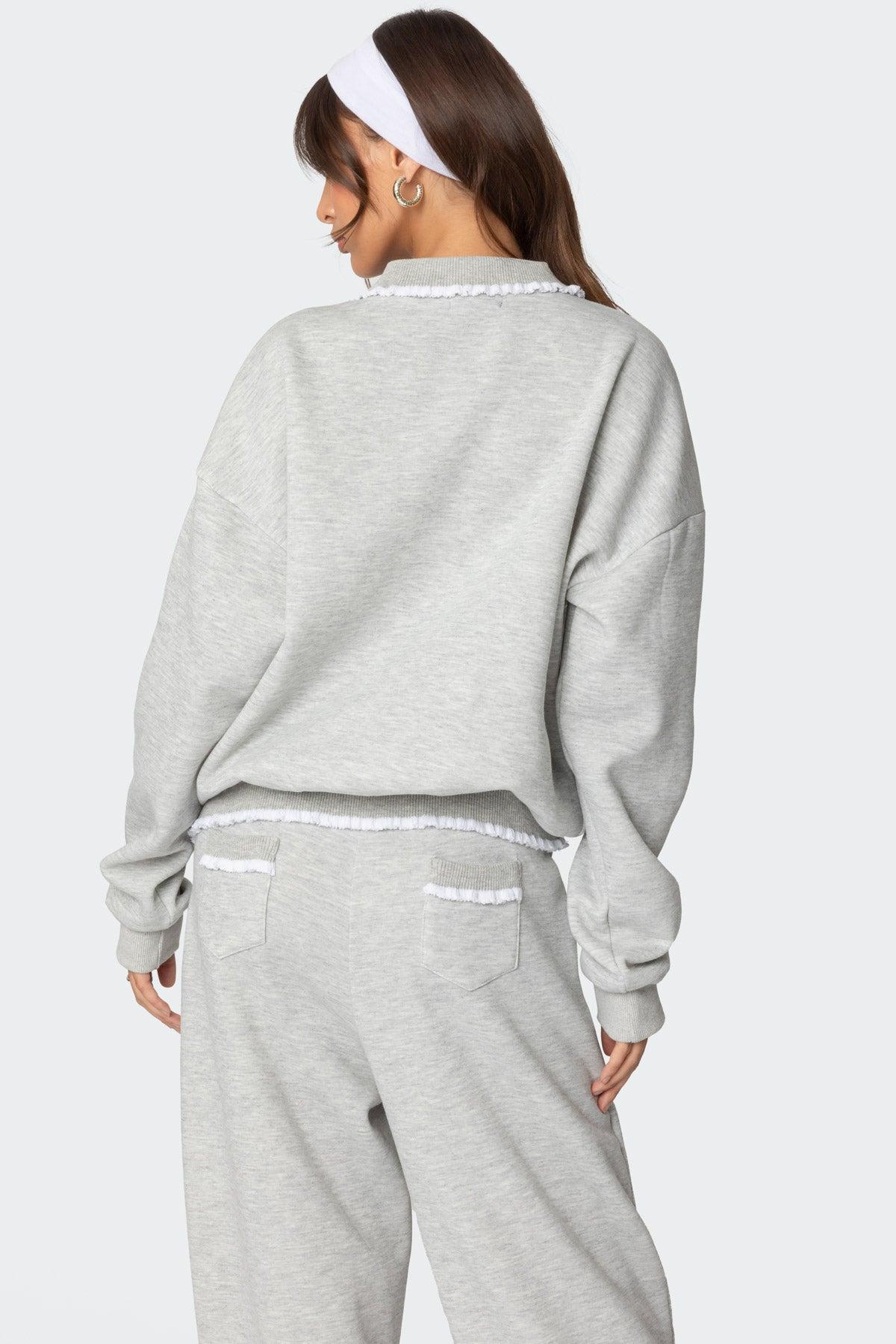 Ashtin Ruffle Trim Sweatshirt Product Image