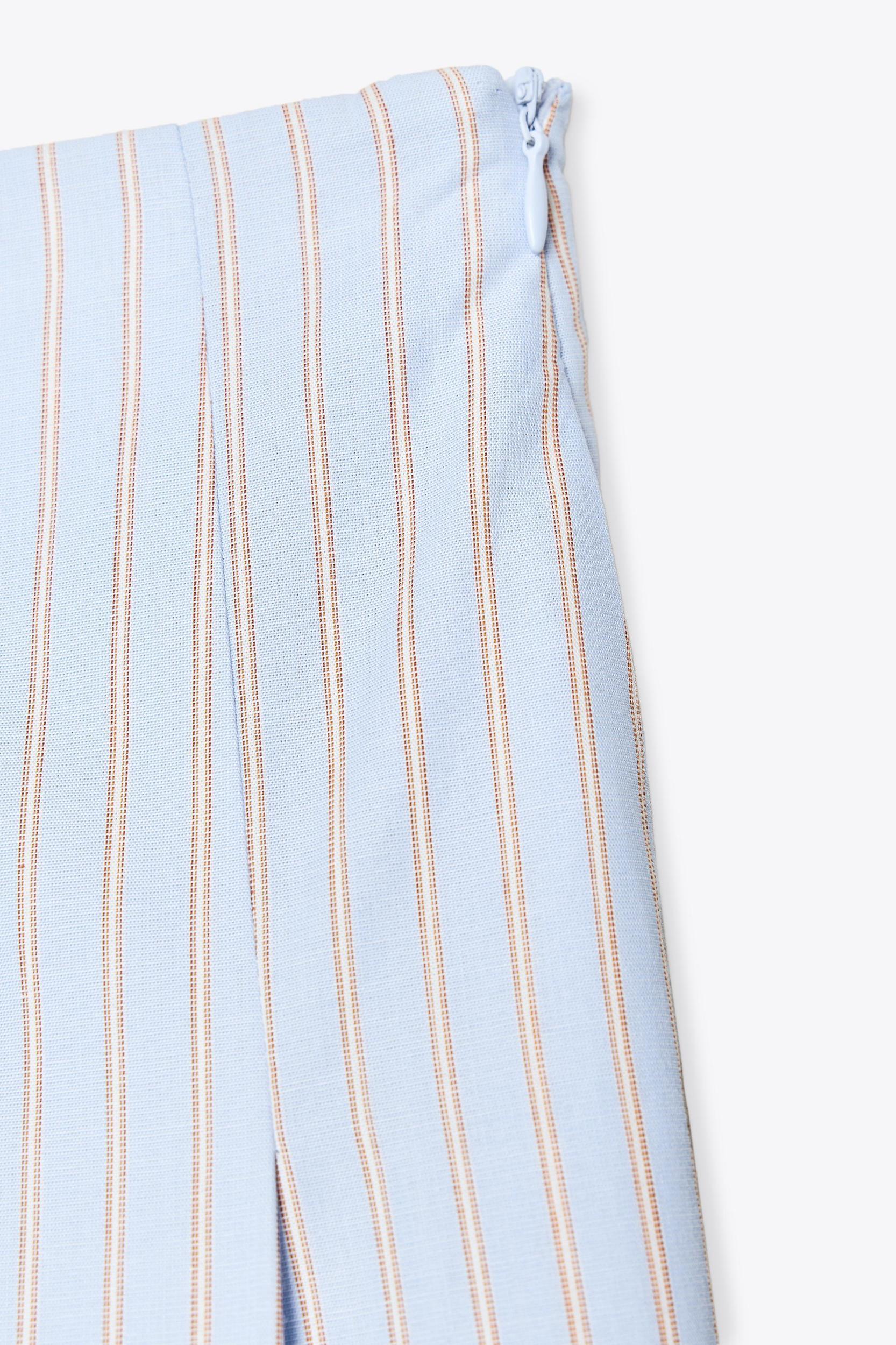 PLEATED STRIPED MIDI SKIRT Product Image