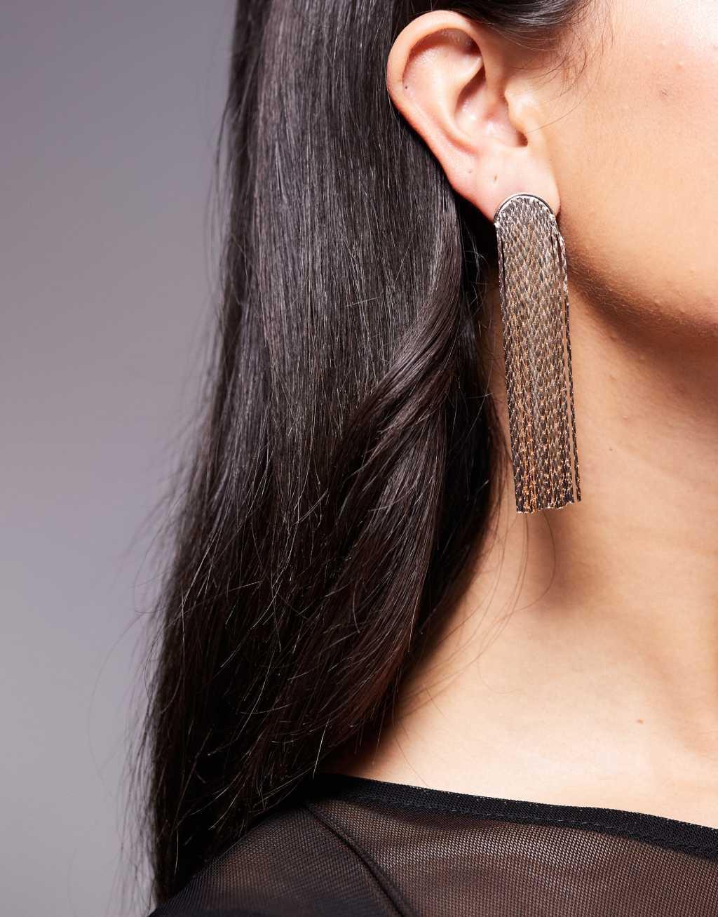 ASOS DESIGN drop earrings with shimmer chain tassel detail in gold tone Product Image