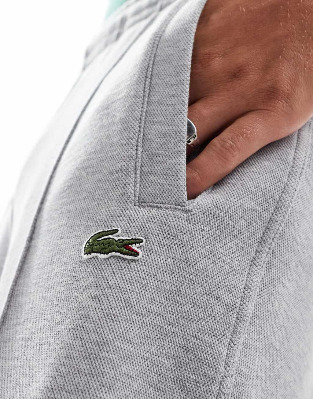 Lacoste logo sweatpants in gray Product Image