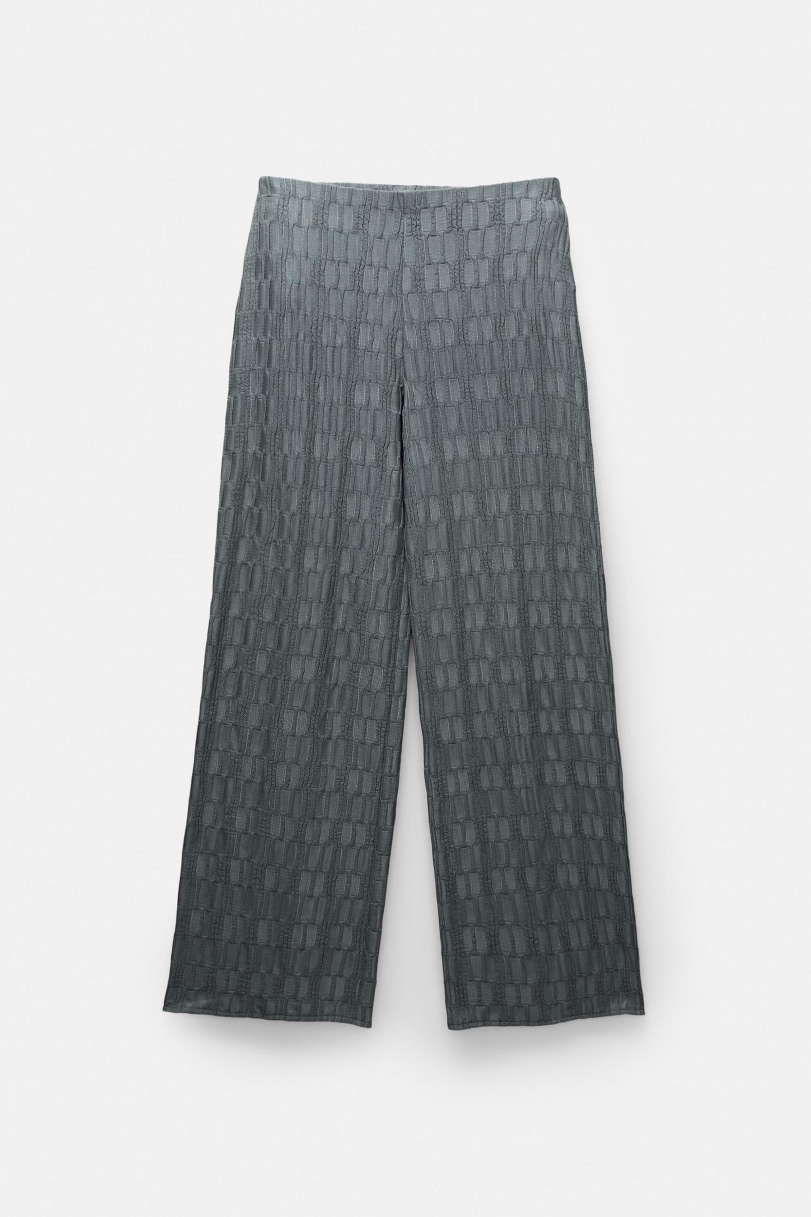 Textured bell bottom trousers Product Image