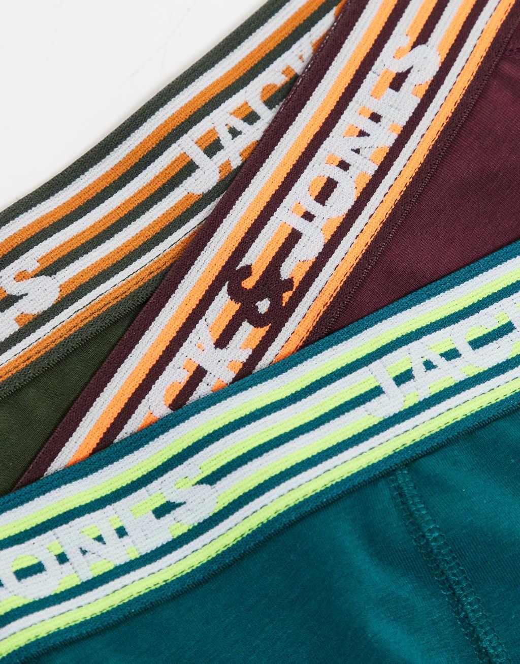 Jack & Jones 3 pack trunks with neon striped waist band in green & burgandy Product Image