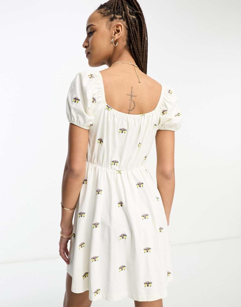 ASOS DESIGN embroidered v neck mini dress with mushroom embroidery Product Image