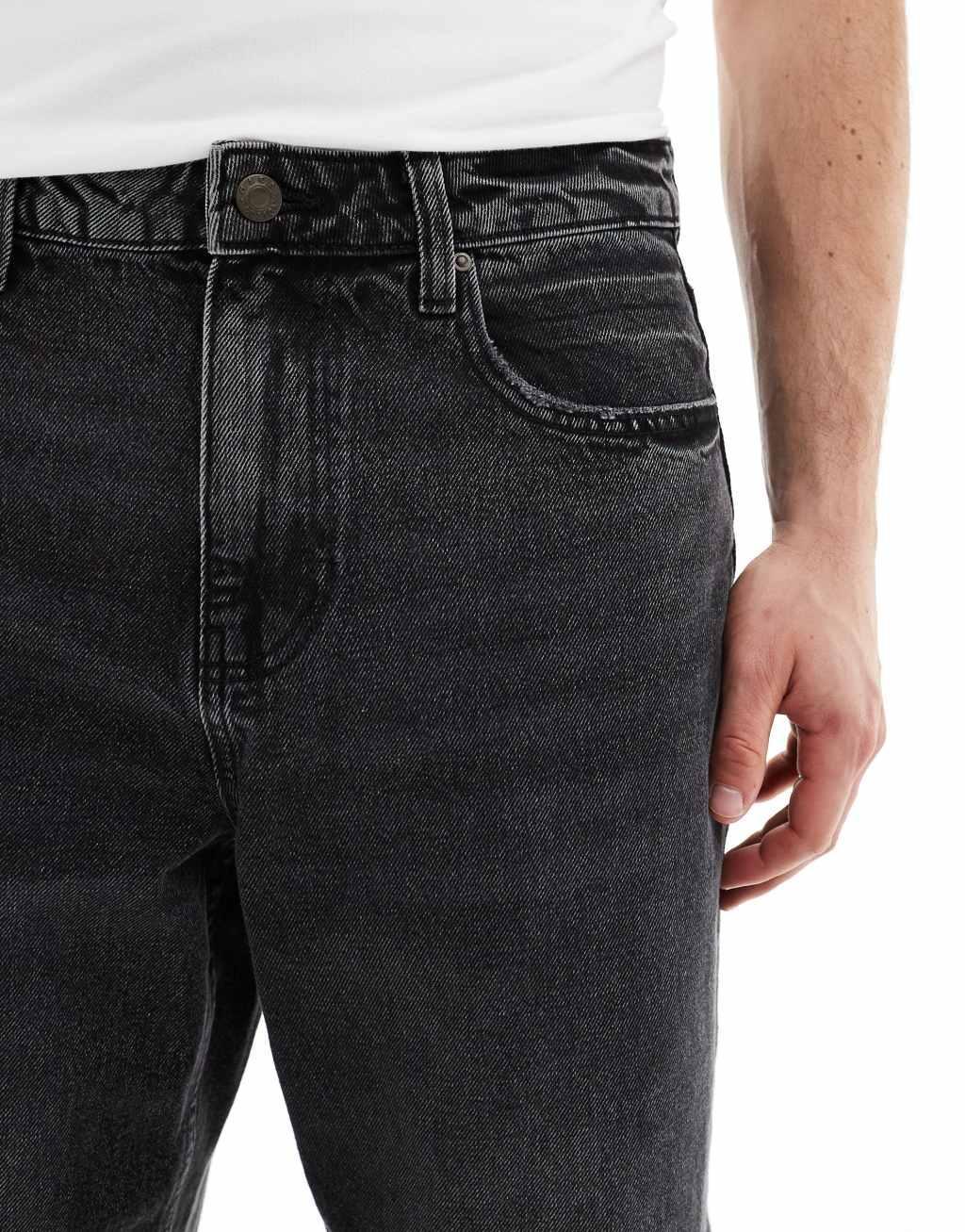 ASOS DESIGN tapered fit jeans with darts in black Product Image