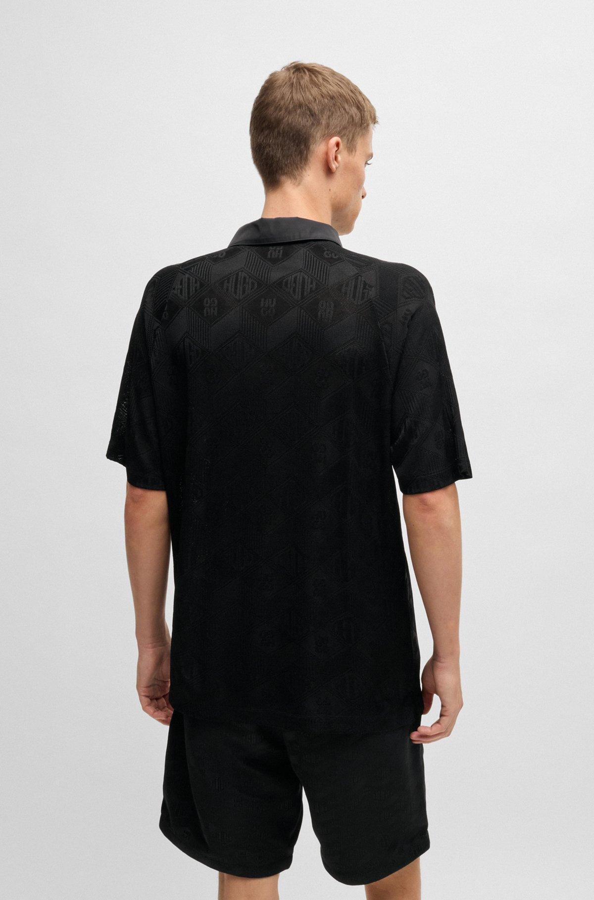 Logo-pattern polo shirt with contrast placket Product Image