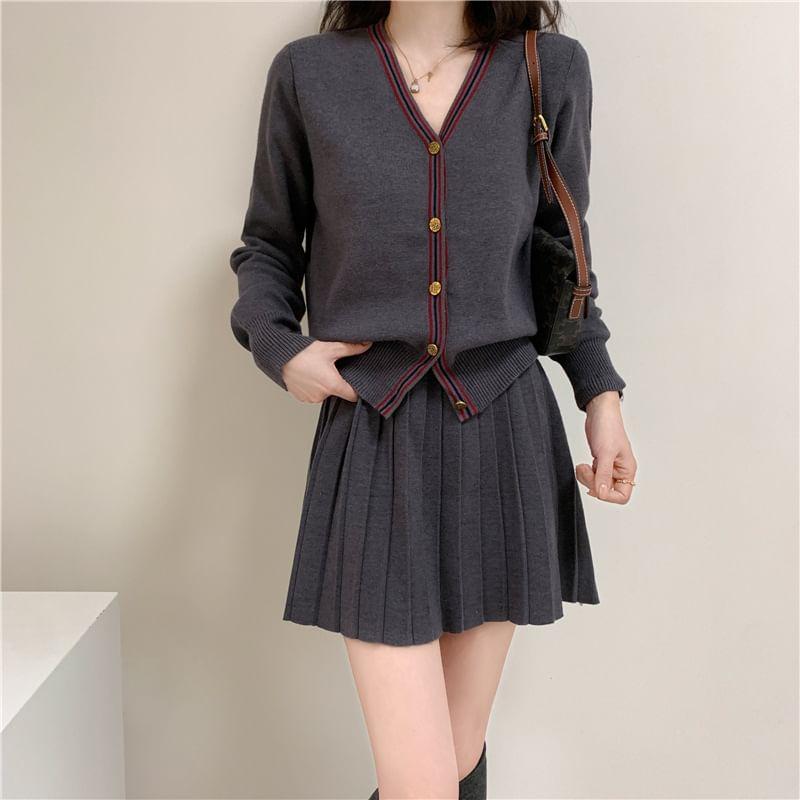 Set: V-Neck Contrast Trim Button-Up Cardigan + High Waist Plain Pleated Knit Mini A-Line Skirt Product Image