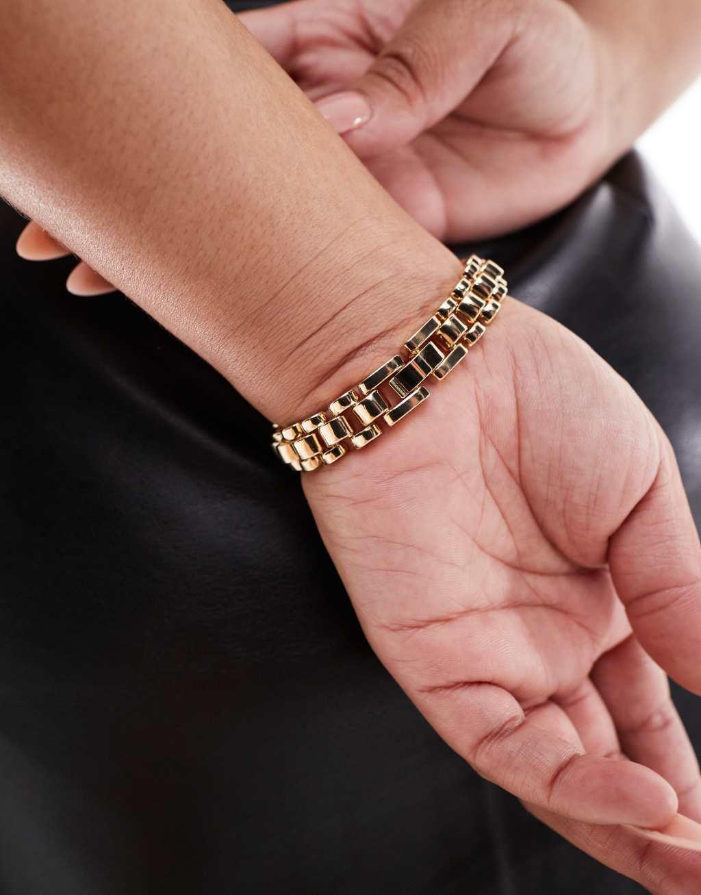 ASOS DESIGN Curve bracelet with watch strap style detail in gold tone Product Image