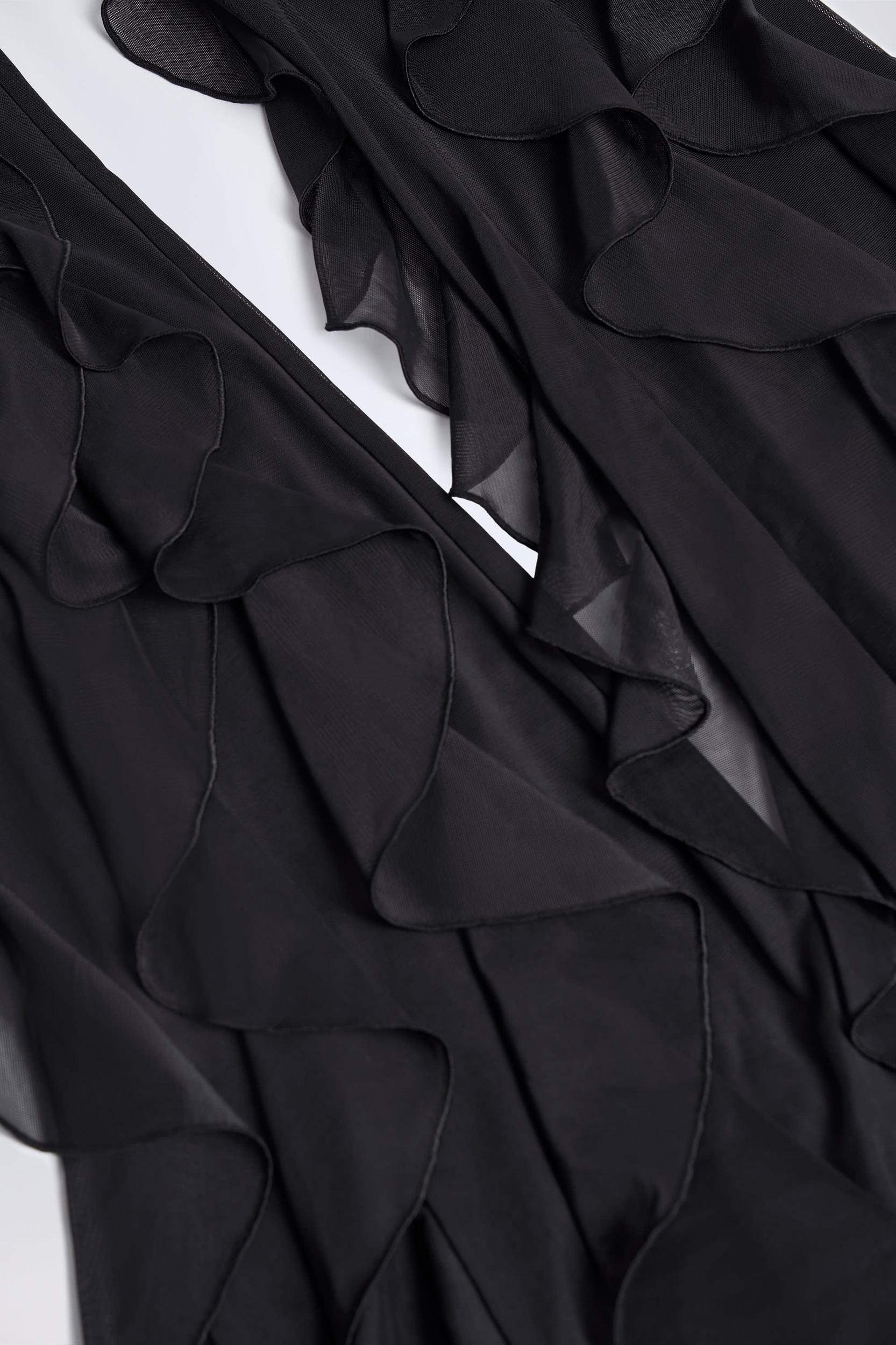 Ruffled Mid-Rise Flared Trousers in Black Product Image