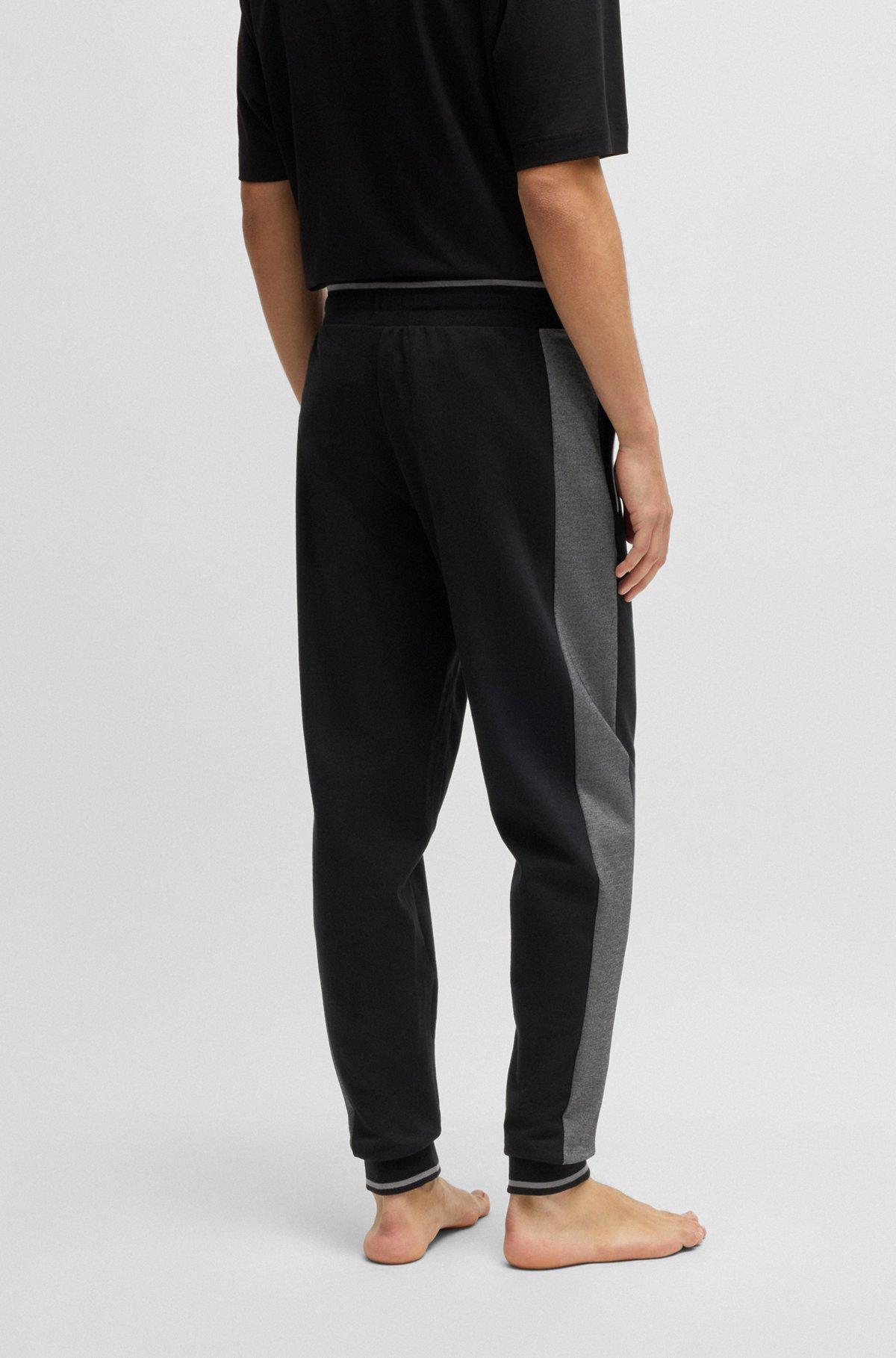 Tracksuit bottoms with contrast piping Product Image