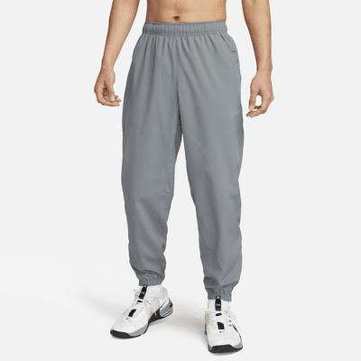 Nike Mens Form Dri-FIT Tapered Versatile Pants | FB7497-084 Product Image