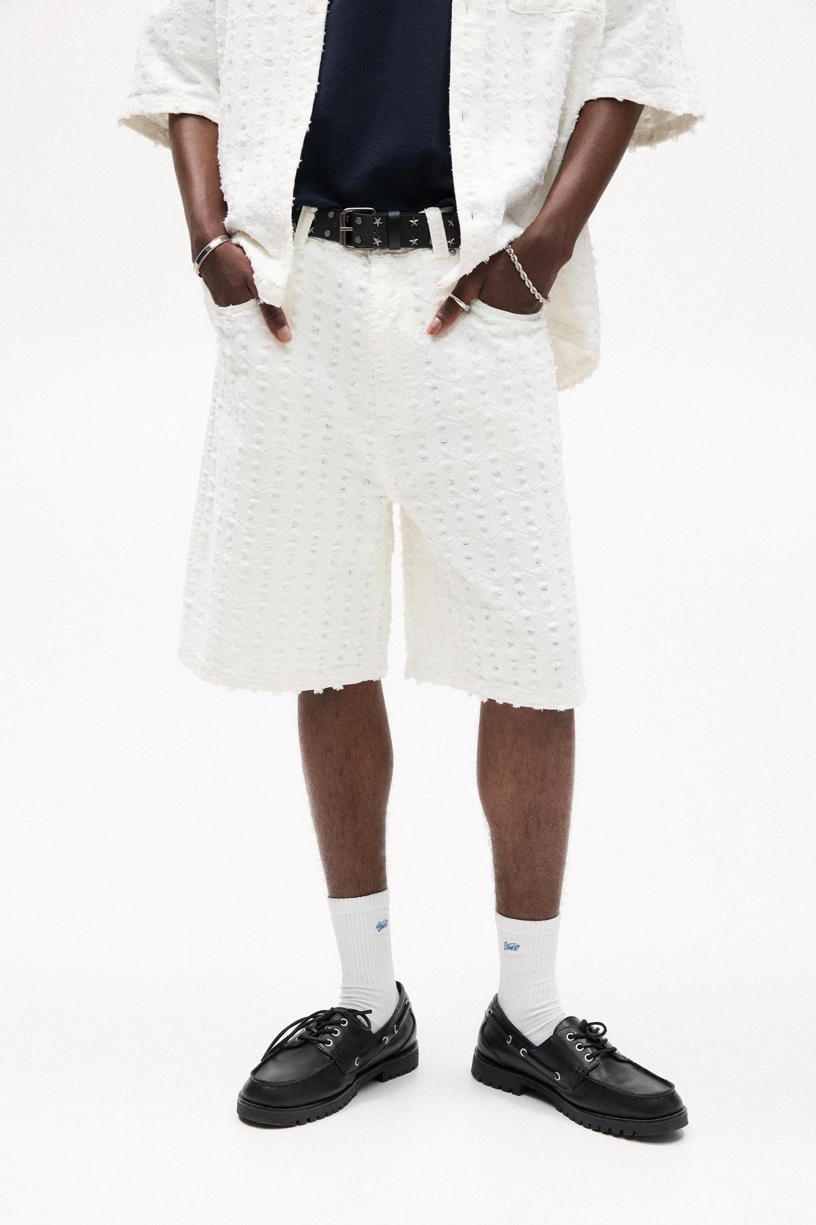 Textured baggy denim Bermuda shorts Product Image