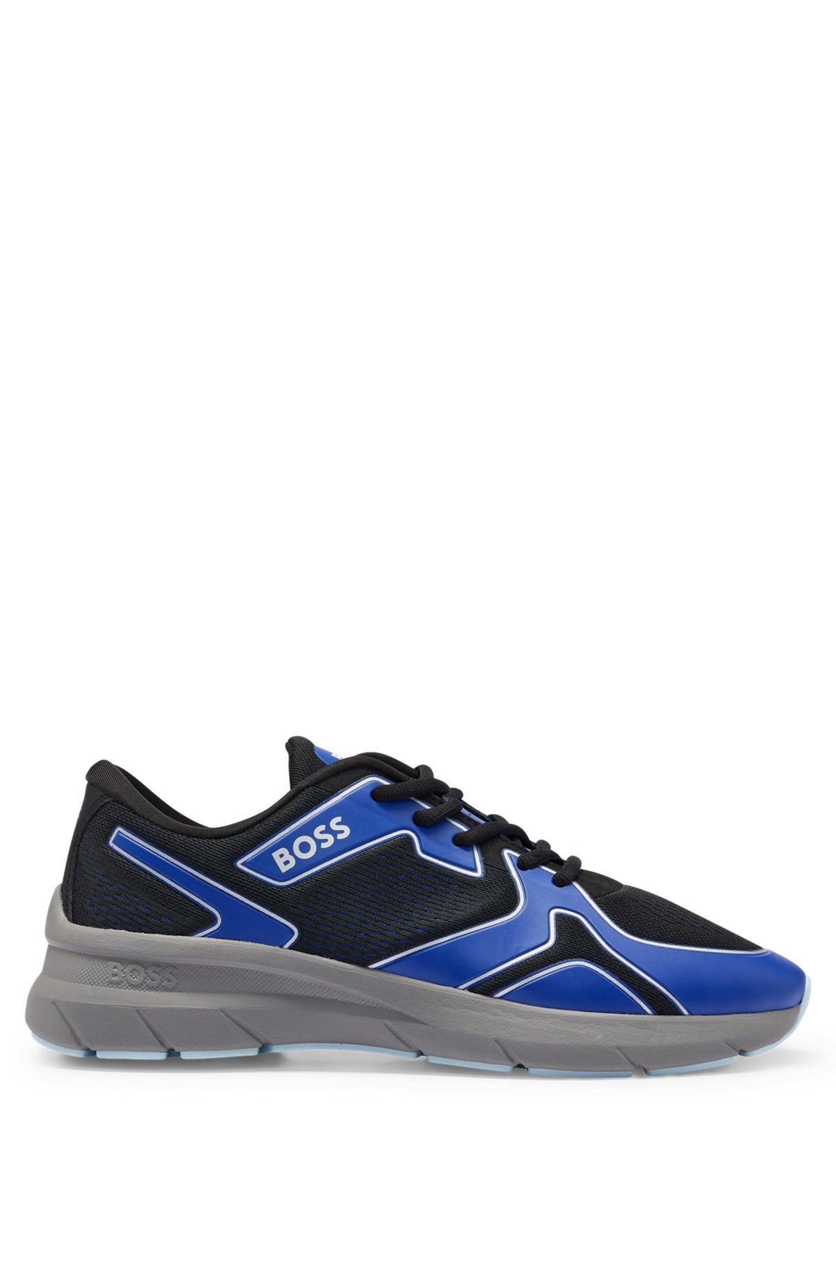 Mixed-material trainers with rubberized faux leather Product Image