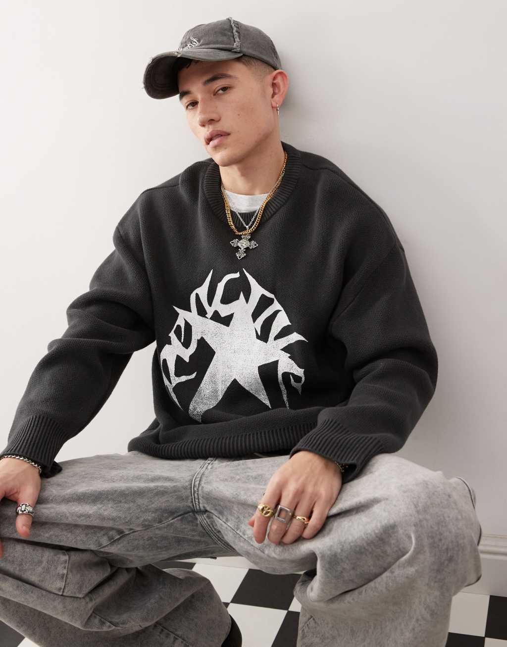 Weekday Cypher oversized sweater with star jacquard graphic in dark gray Product Image