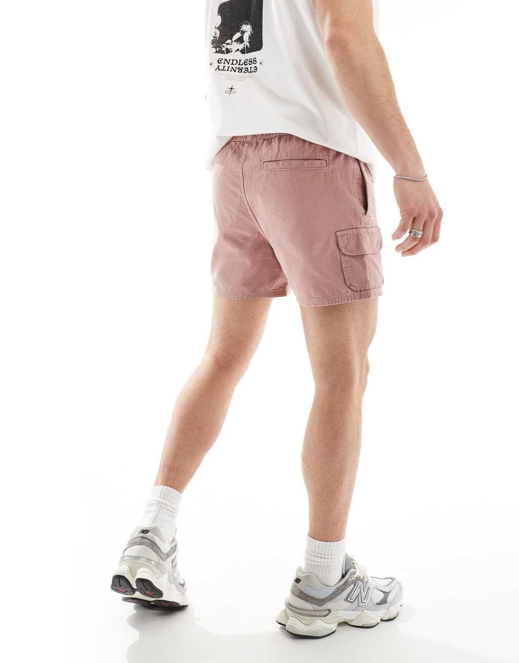 ASOS DESIGN slim cargo shorts in pink Product Image