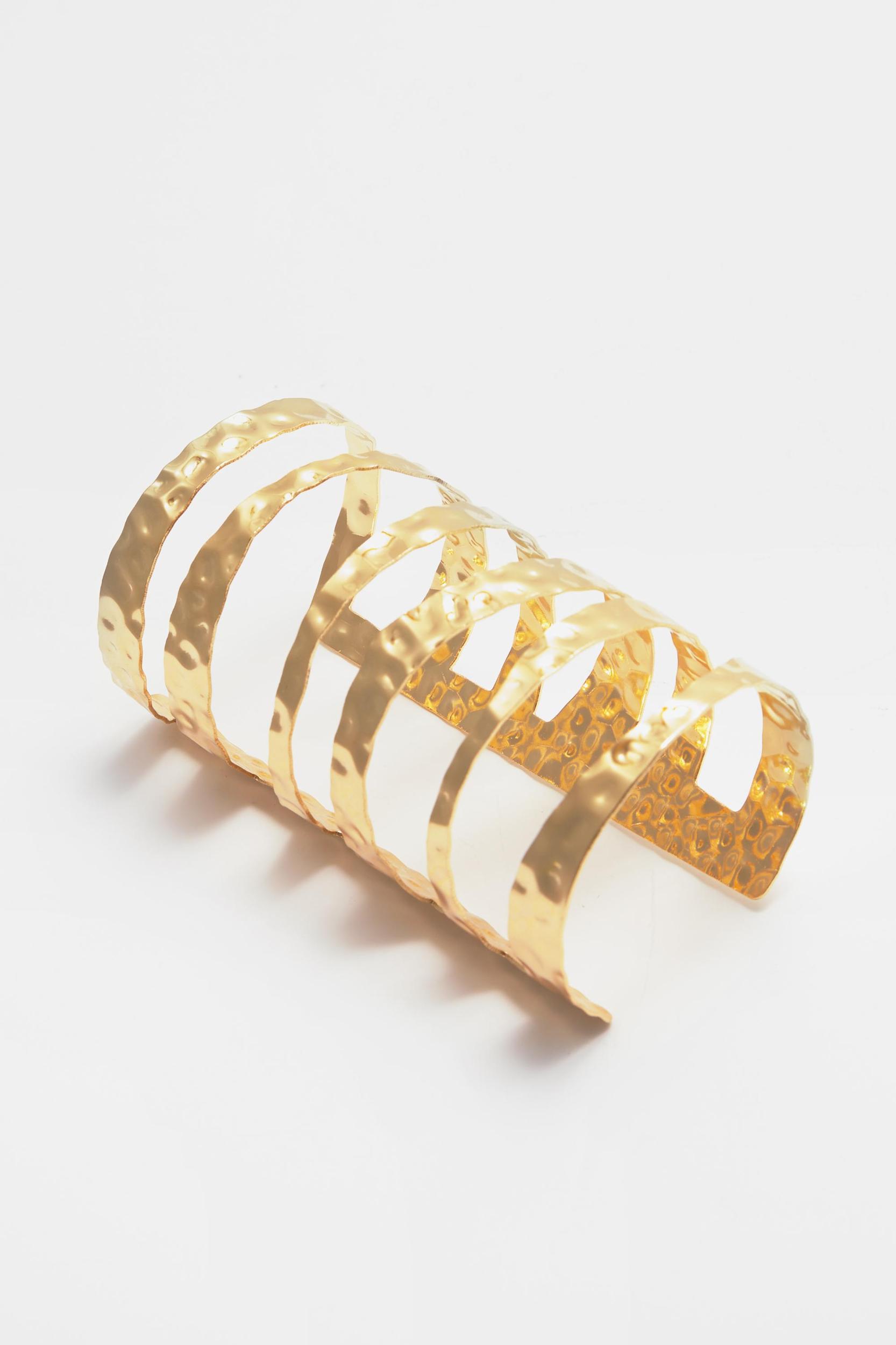 Cuff bracelet with metal openings Product Image