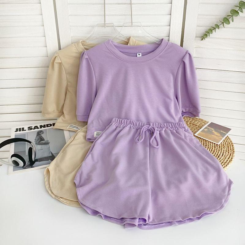 Set: Short-Sleeve Round Neck Plain Asymmetrical Tee + Drawstring Waist Sweat Shorts Product Image