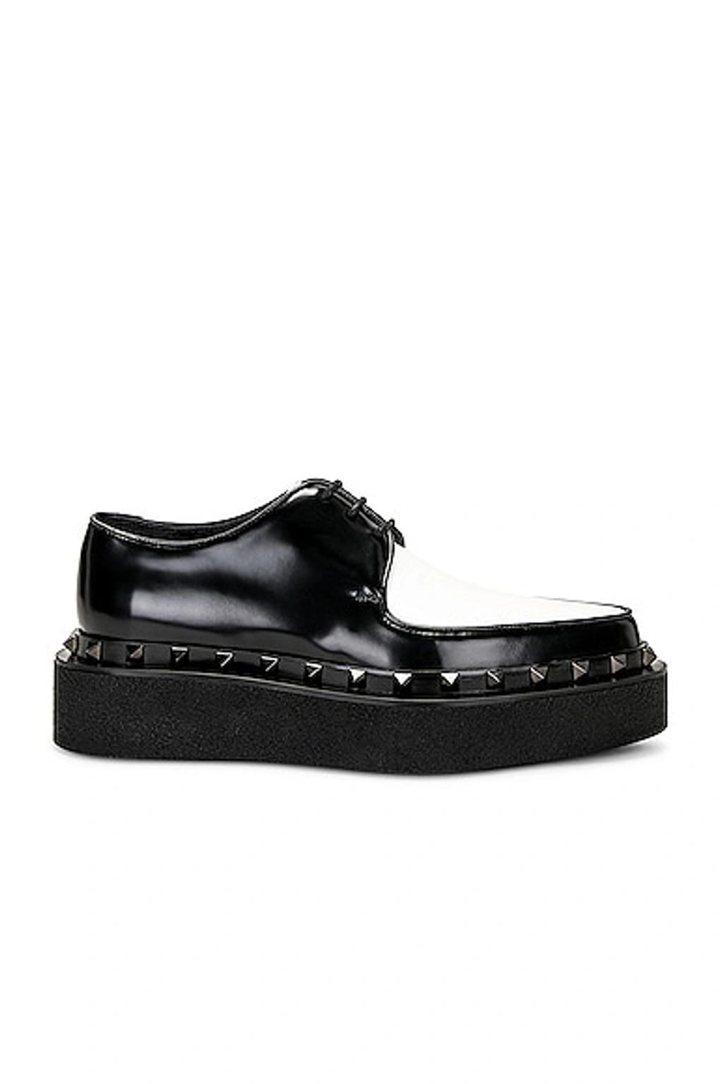 VALENTINO GARAVANI Women's Rockstud M-way Calfskin Derby Shoes With Matching Studs In Black White Product Image