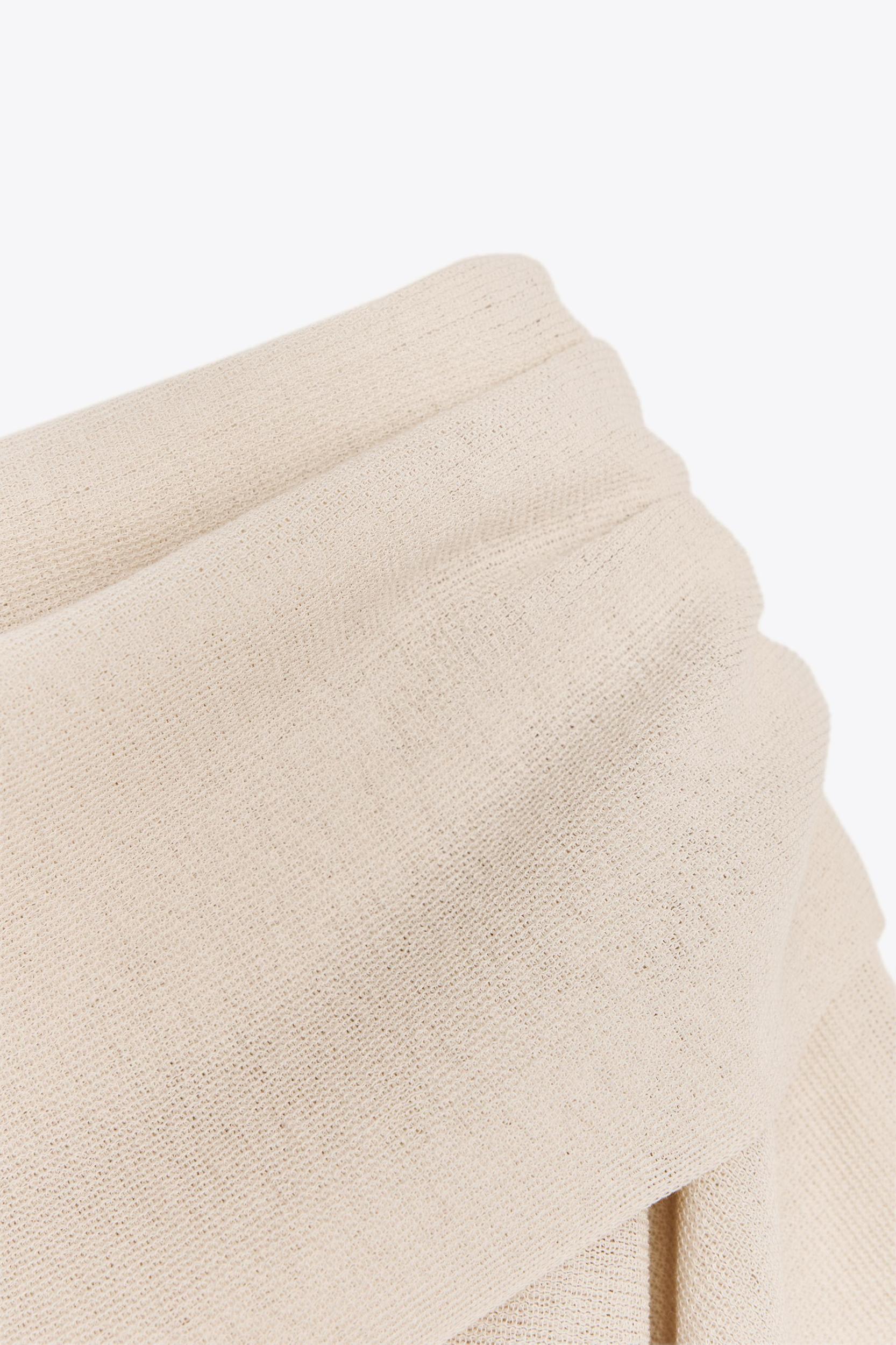 SMOOTH KNIT LAYER TOP Product Image