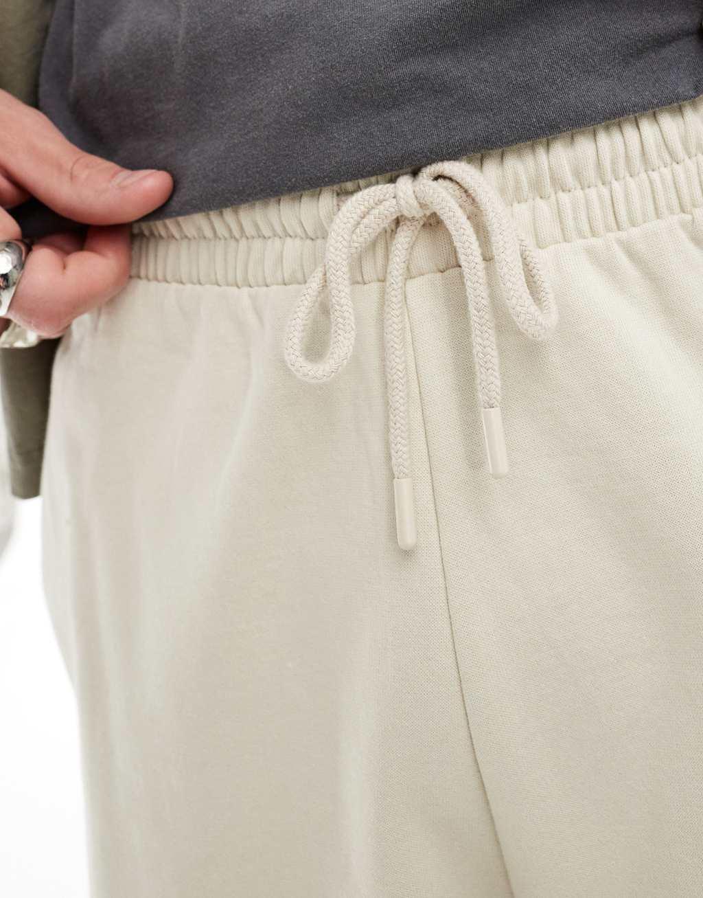 ASOS DESIGN oversized shorts in stone Product Image