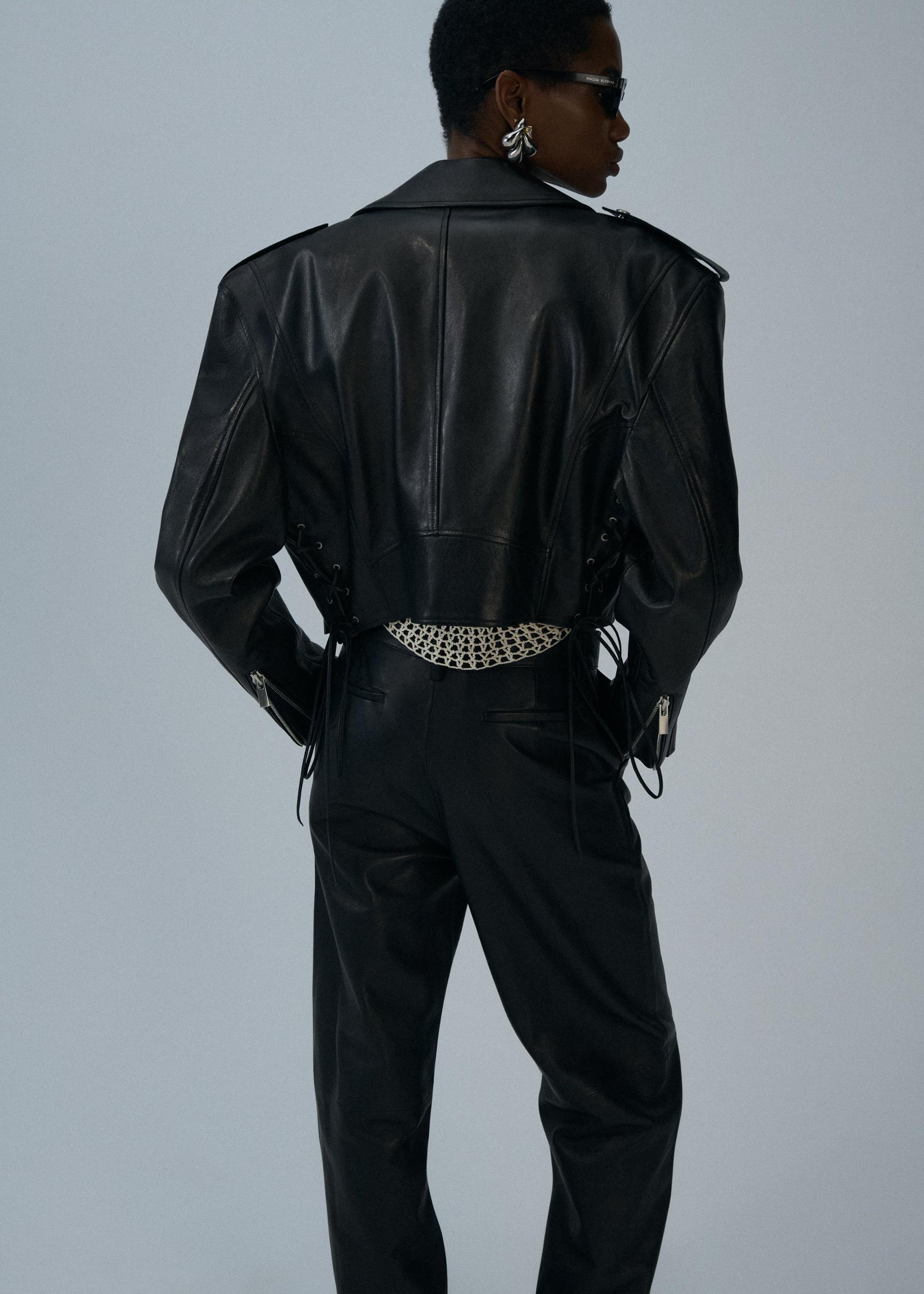 Cropped biker jacket in black leather Product Image