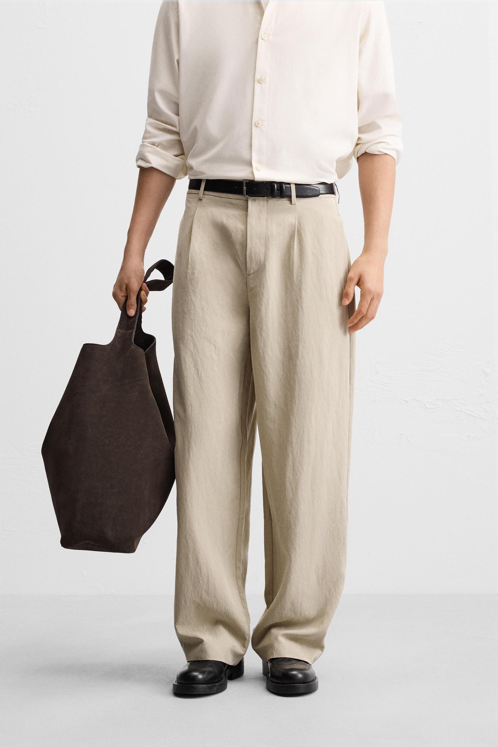 PLEATED WIDE FIT PANTS Product Image
