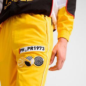 PUMA x PORSCHE Men's Basketball Woven Pants in Sport Yellow/Black Product Image