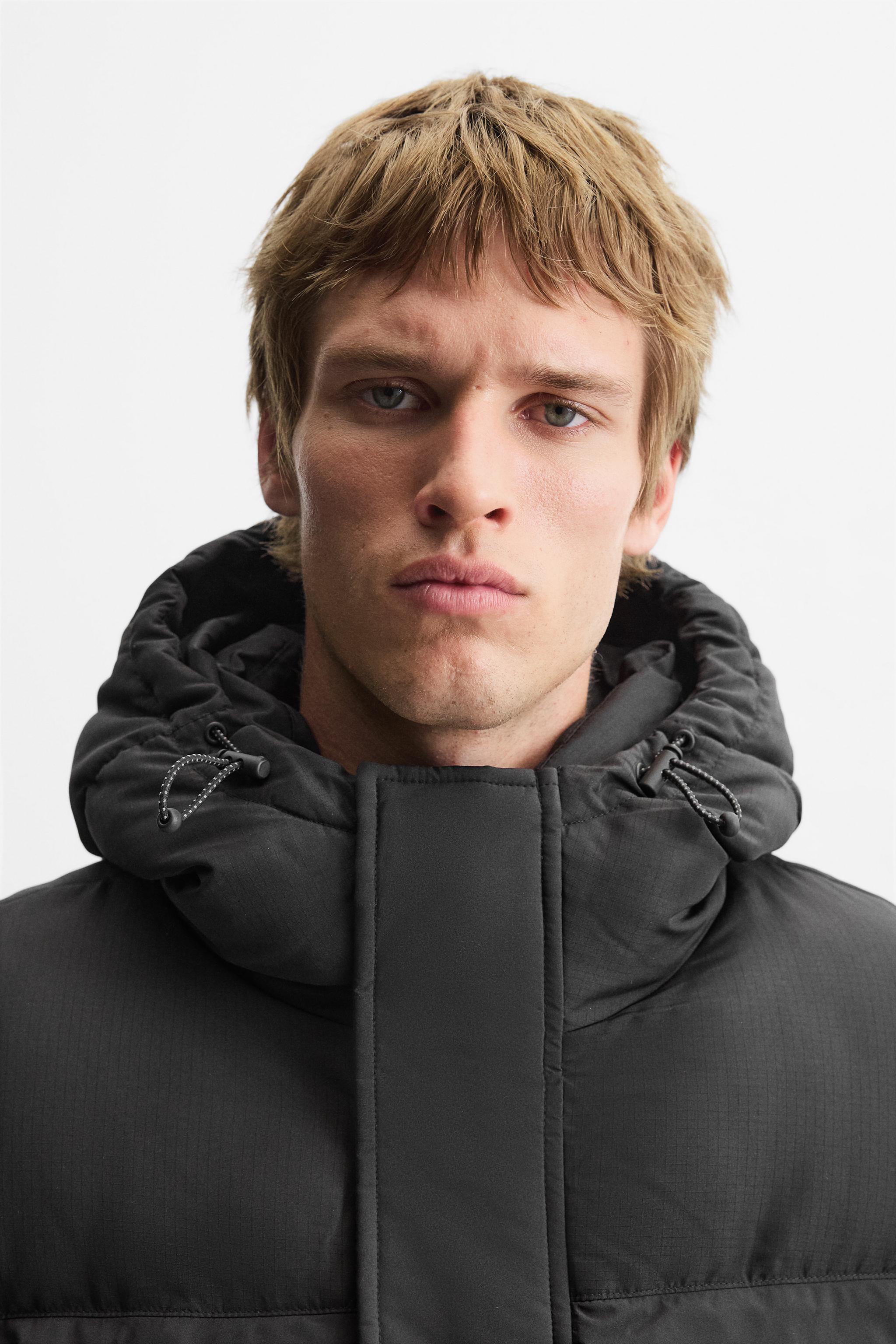 HOODED QUILTED JACKET Product Image