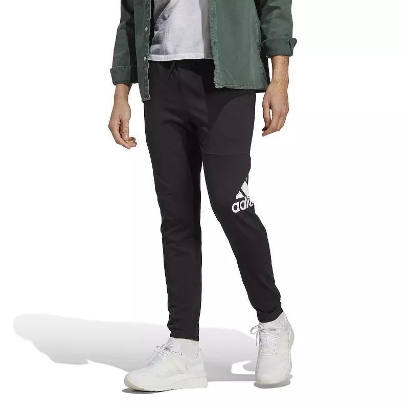 adidas Essentials Single Jersey Tapered Badge Of Sport Pants (Ink) Men's Clothing Product Image