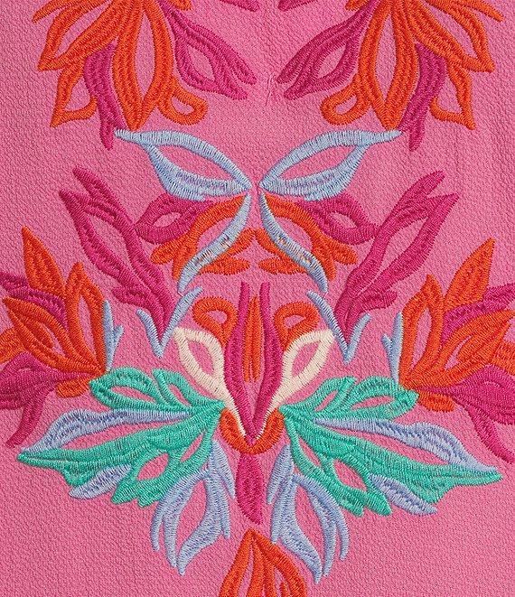 Calessa Embroidered Ruffled V-Neck Cap Sleeve Shirttail Hem Top Product Image