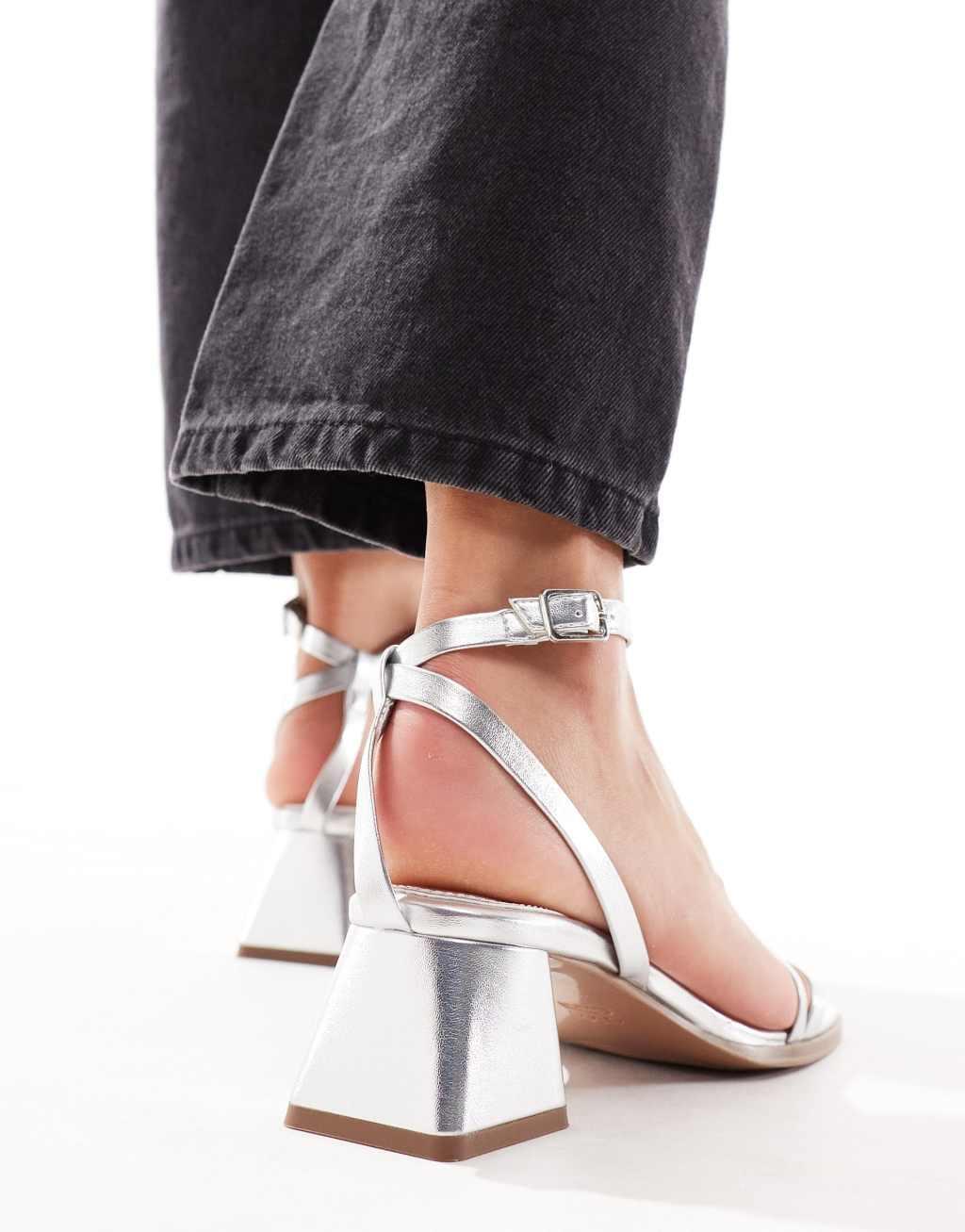 ASOS DESIGN Hibiscus asymmetric mid block heeled sandals in silver Product Image