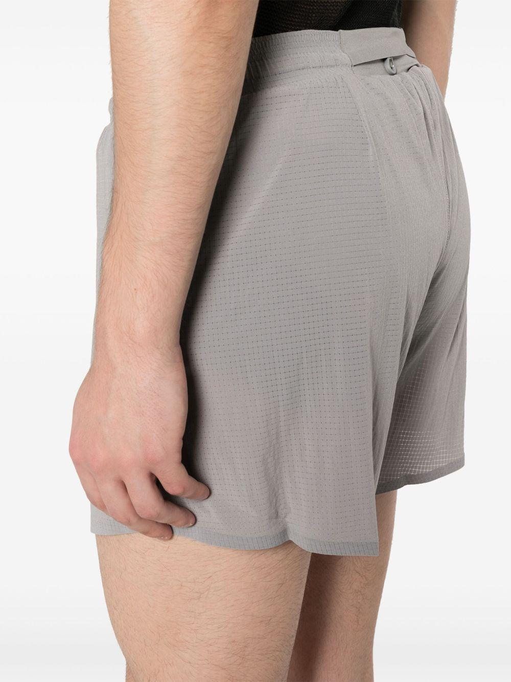 checked running shorts Product Image