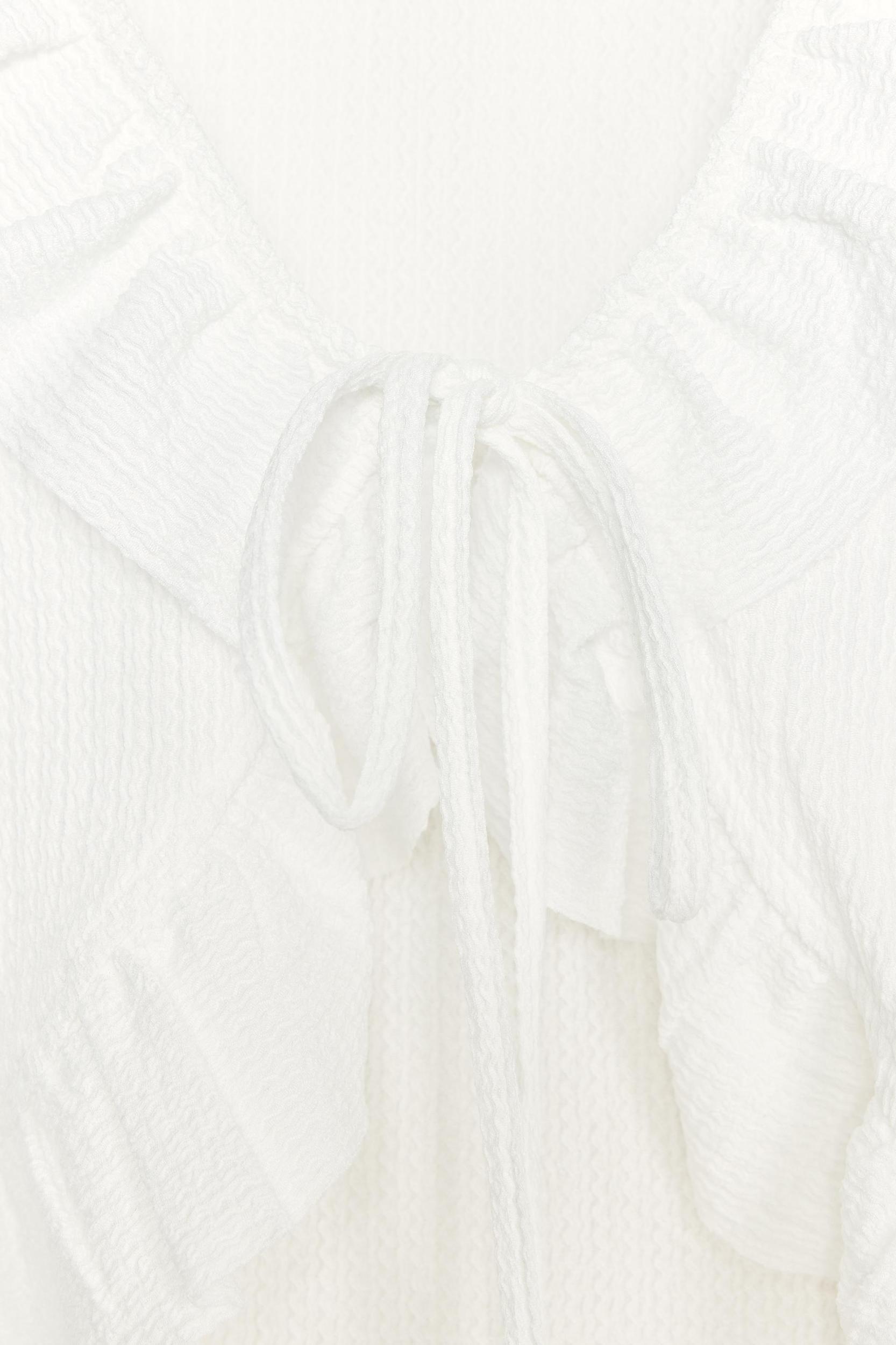 RUFFLED V-NECK TOP Product Image