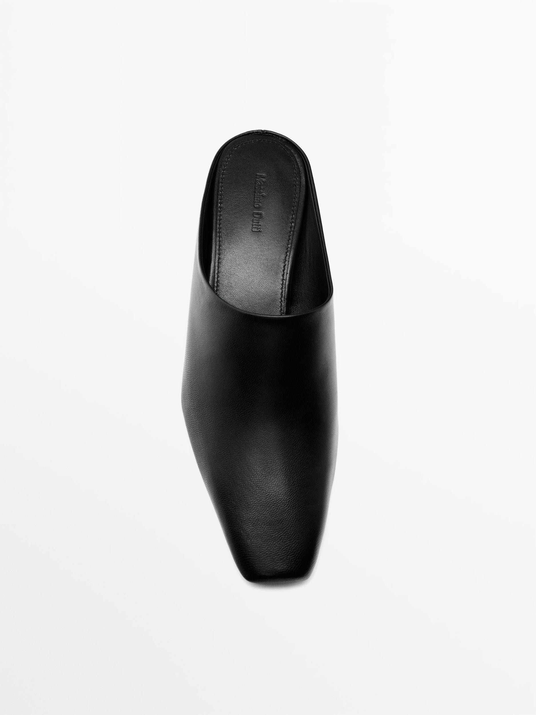 Wedge heeled mules Product Image