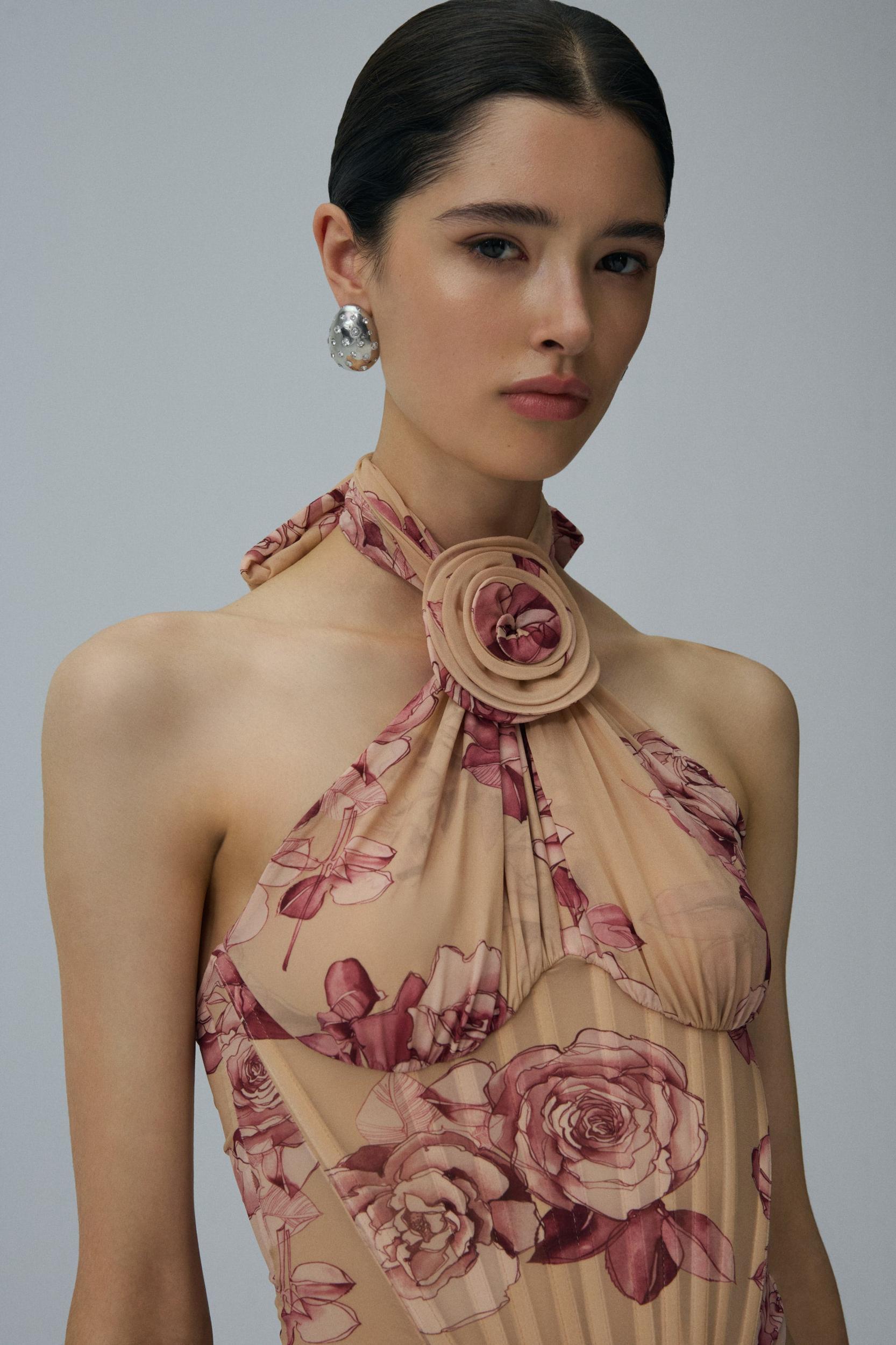 Sheer halter bustier top in beige print Product Image