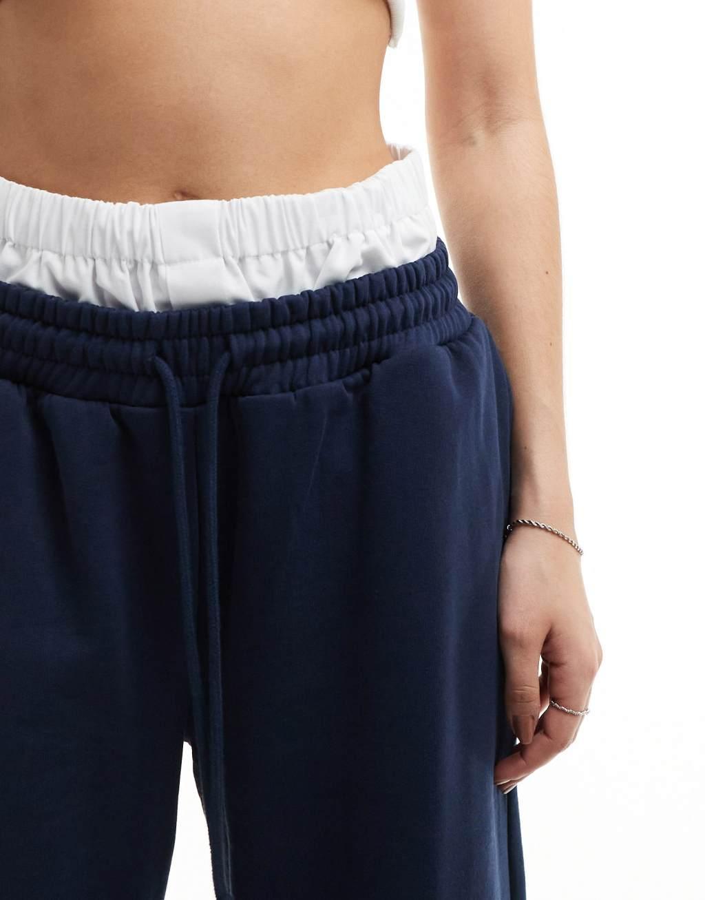 ASOS DESIGN oversized sweatpants with boxer waistband in navy Product Image