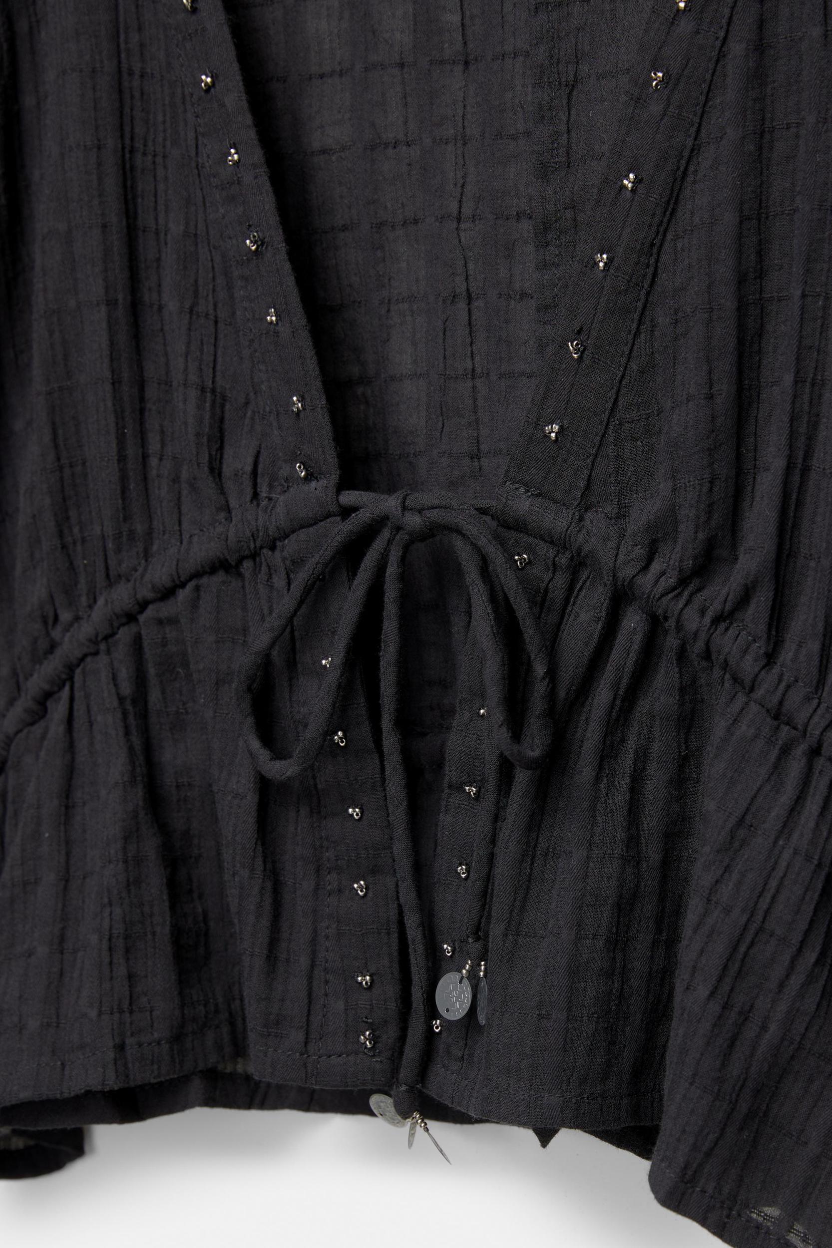 Beaded blouse with bow Product Image